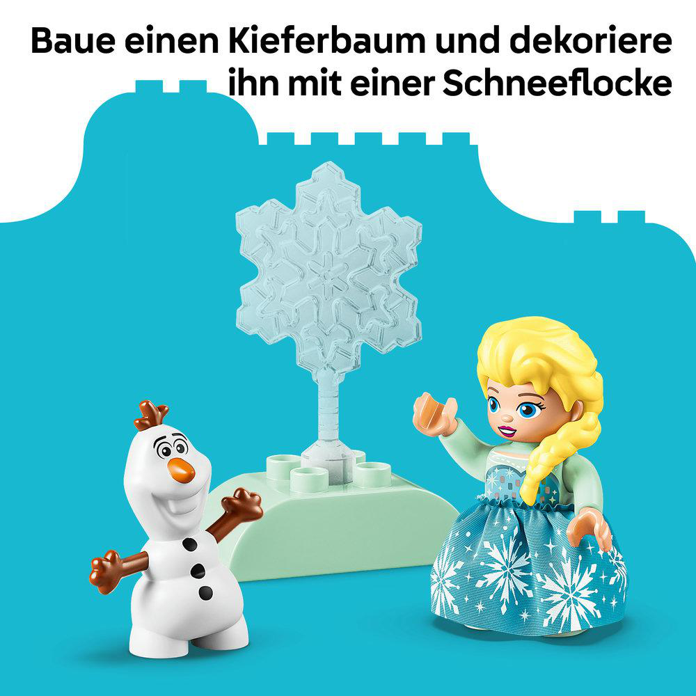 Olaf und Elsa Figuren bauen einen Baum mit Schneeflocke Dekoration.
