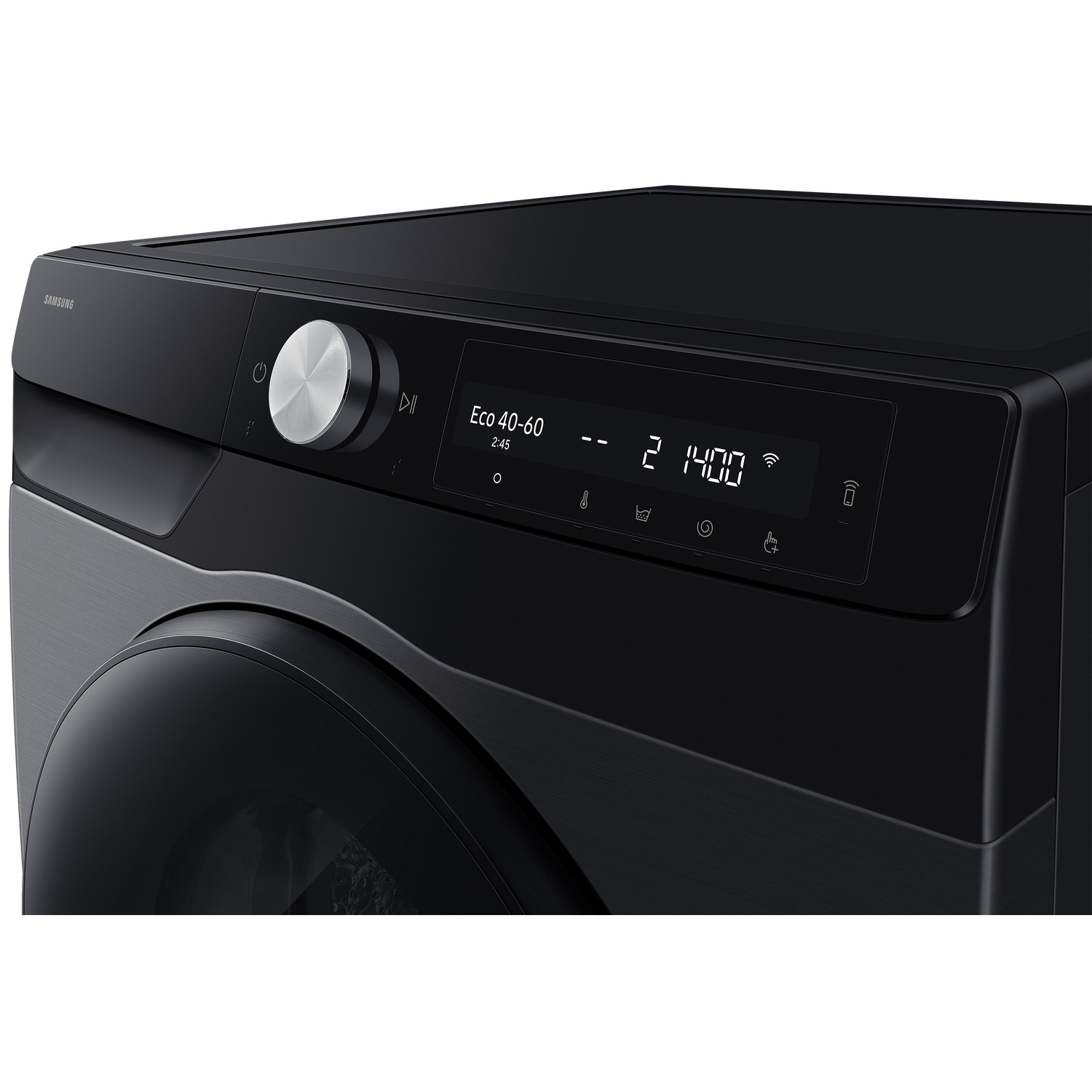 Close-up of a black Samsung washing machine with a silver dial and digital display.