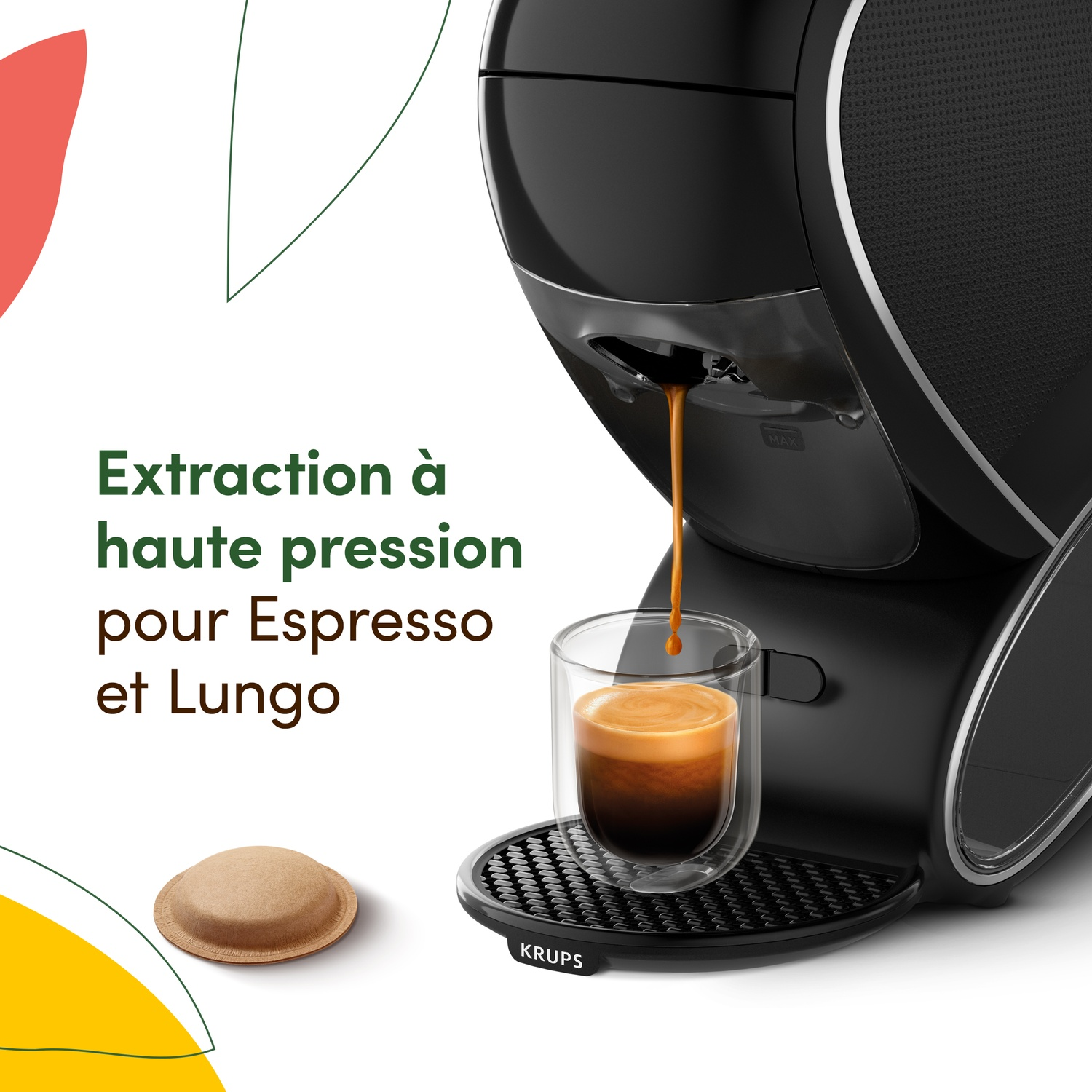 Black coffee machine brewing espresso into a glass. Coffee pod on left.