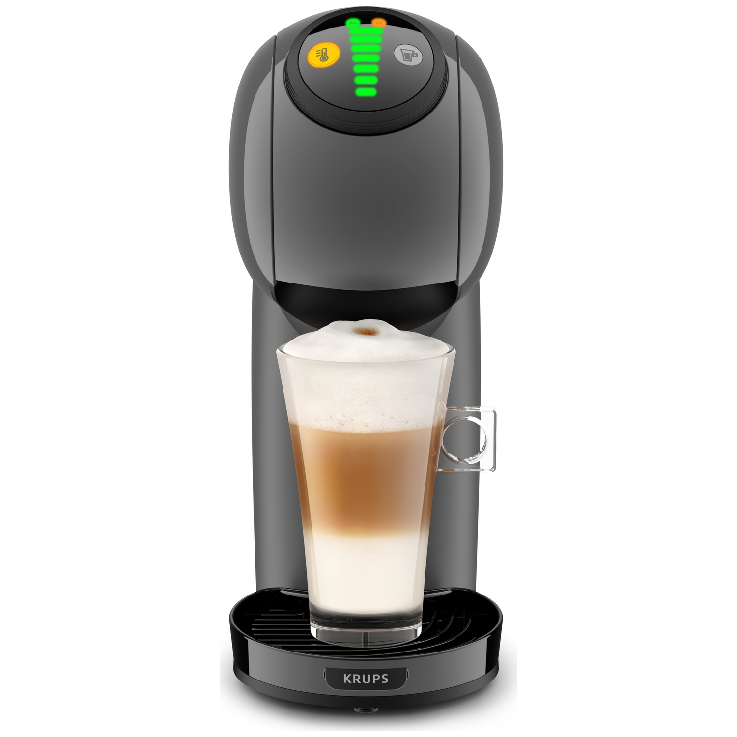 Gray coffee machine with a layered glass of milky coffee and foam.
