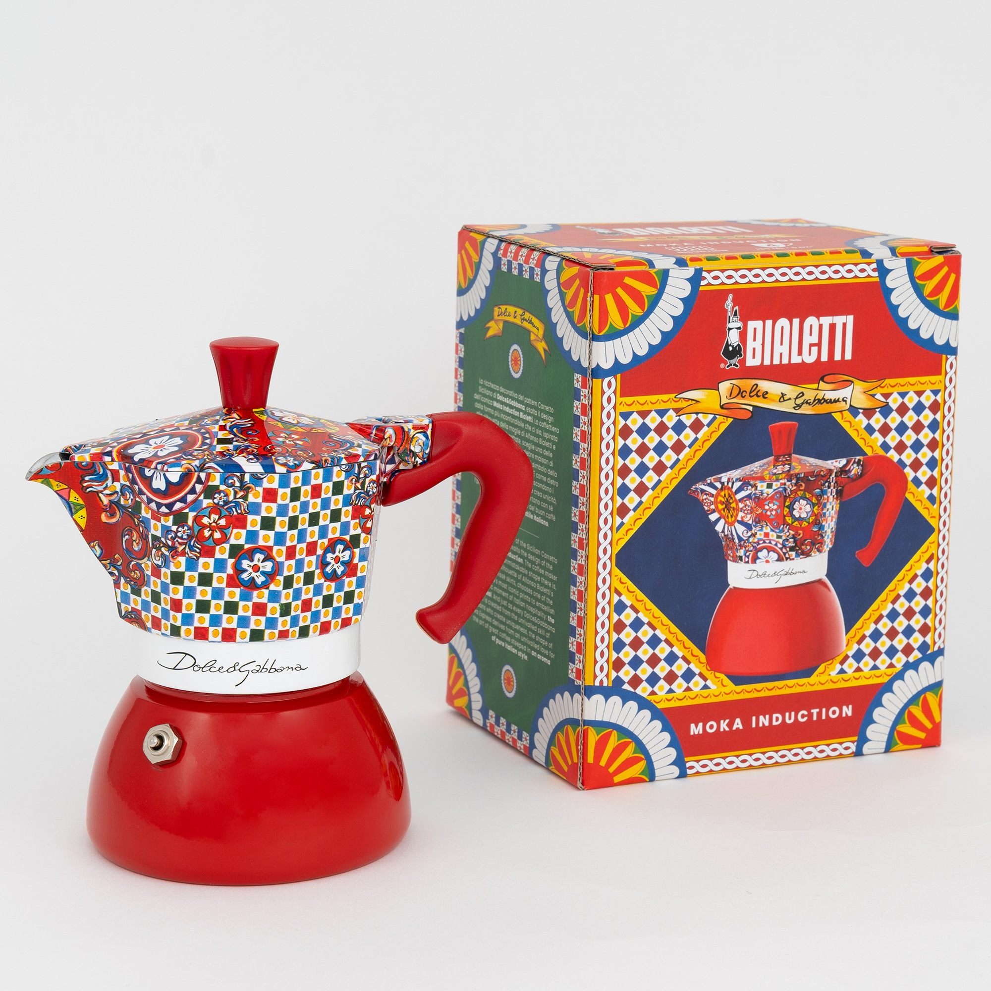 Cafetera moka roja con estampado colorido y caja a juego. Dolce & Gabbana.