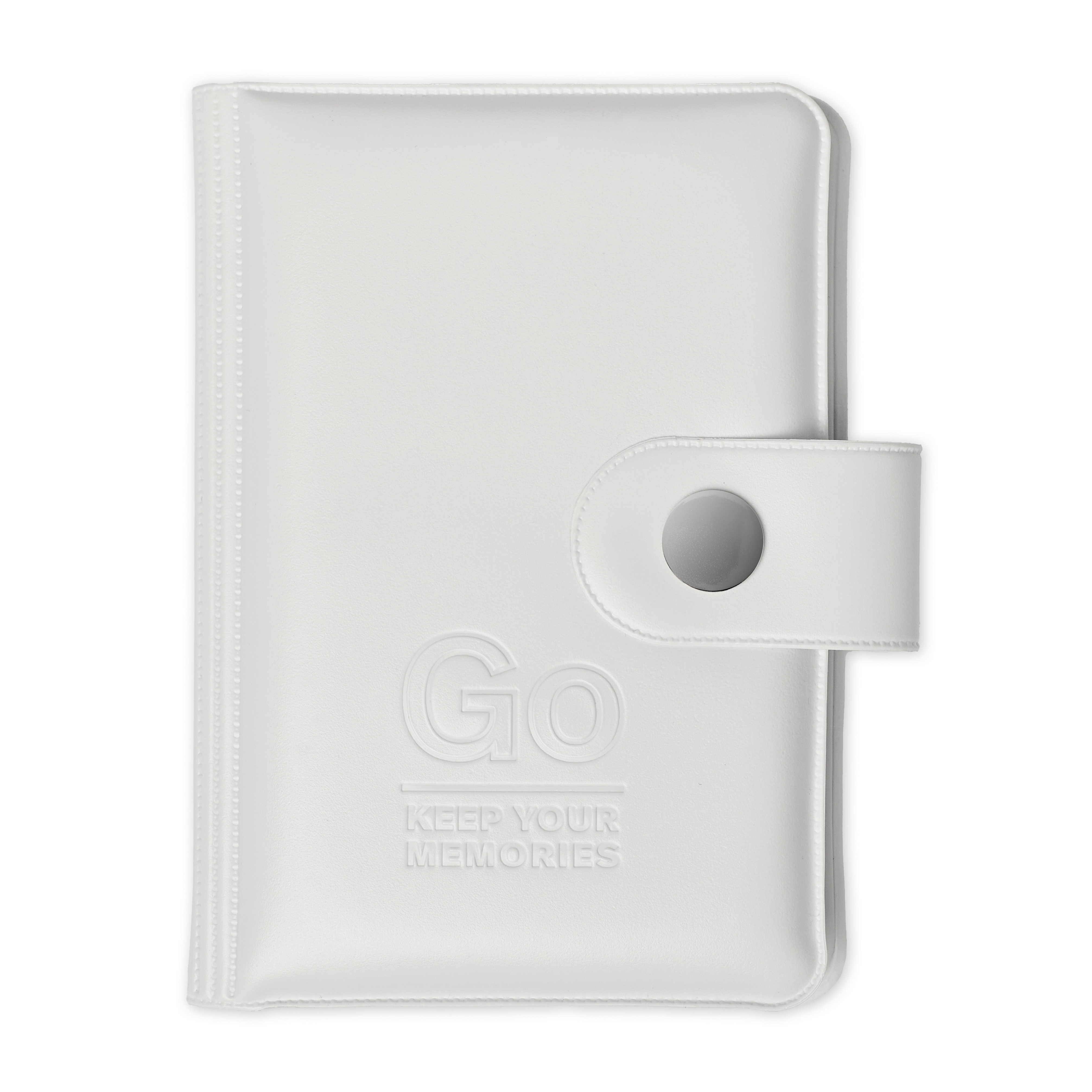 Kabartmalı "Go Keep Your Memories" yazılı beyaz defter ve çıtçıt kapamalı.