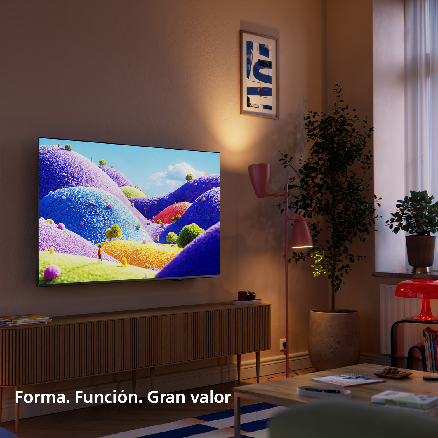 Una sala de estar moderna con un televisor que muestra un paisaje de colinas coloridas.