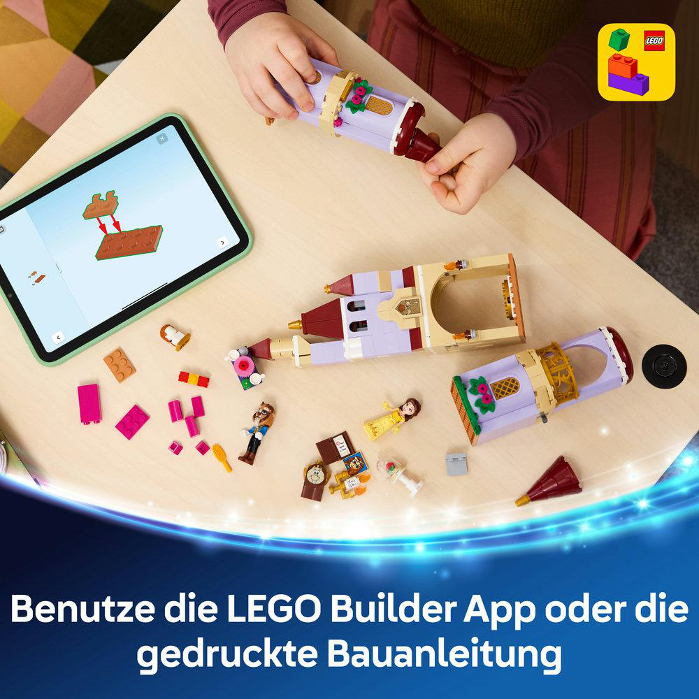 Bunte LEGO-Steine und eine Anleitung auf einem Tablet. Ein Kind baut.