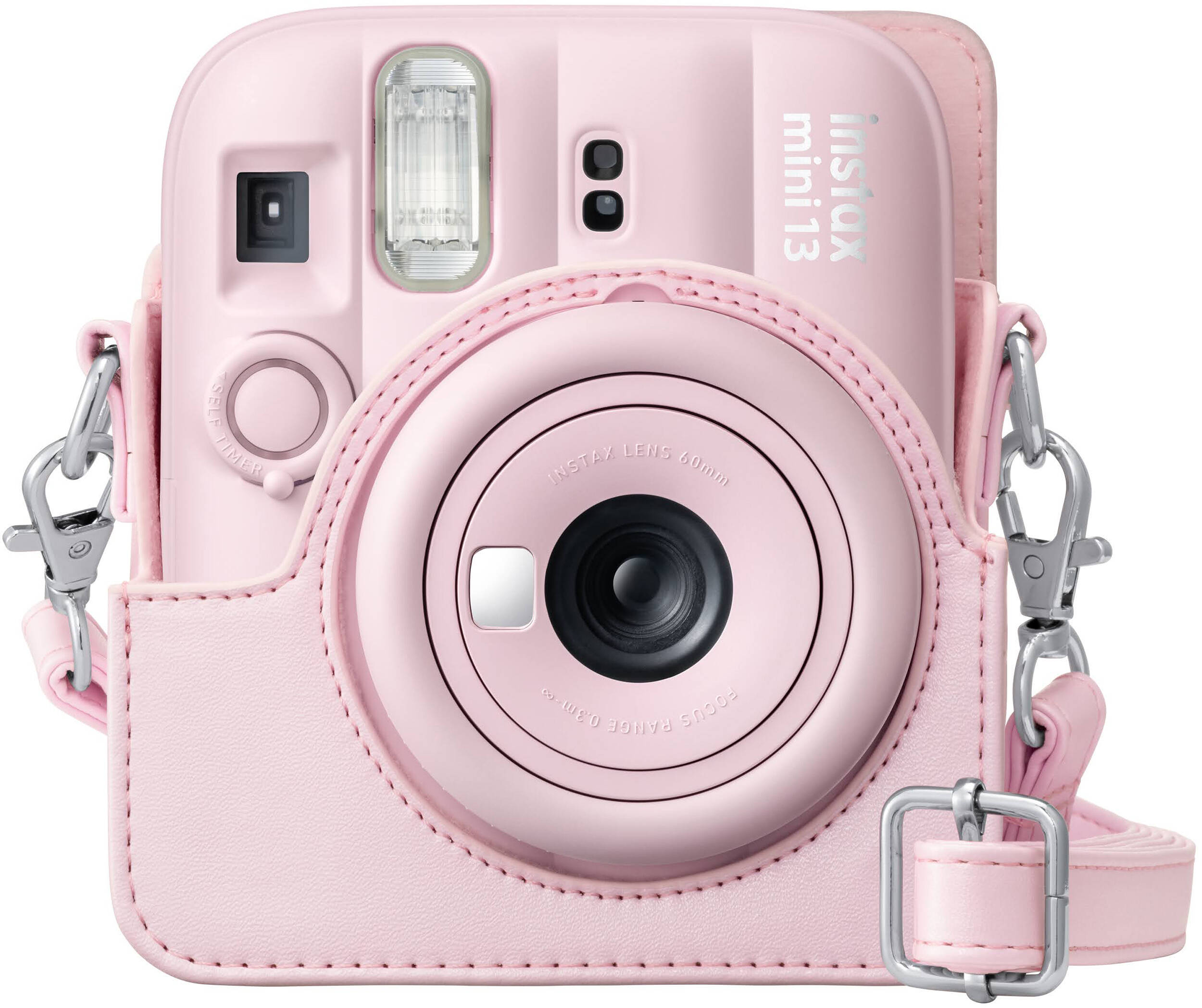 Un appareil photo instantané rose avec un étui et une bandoulière assortis.