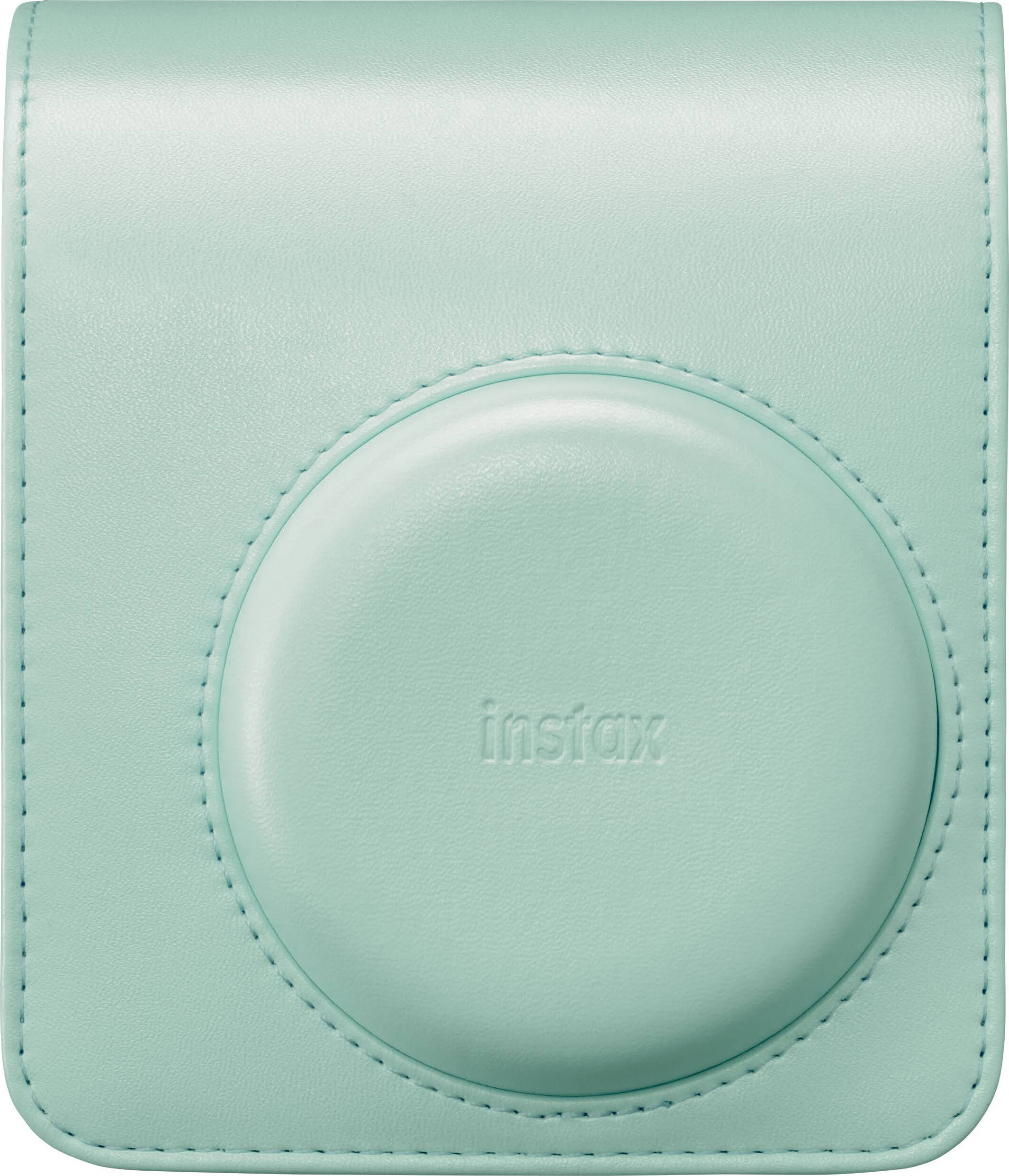 Un étui en cuir vert clair avec découpe ronde pour objectif et texte 'Instax' en relief.