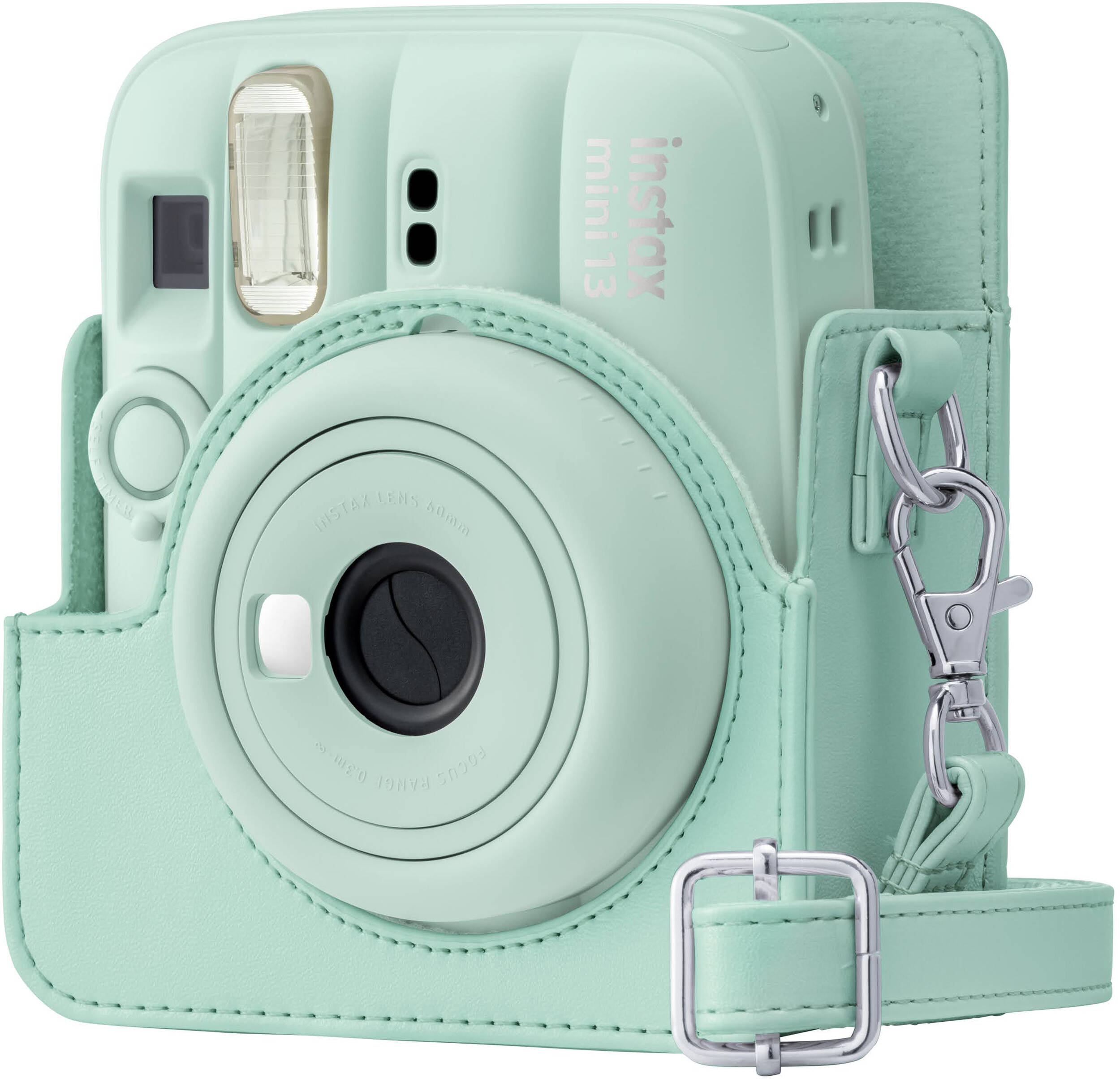 Appareil photo instantané vert menthe dans son étui en cuir assorti.