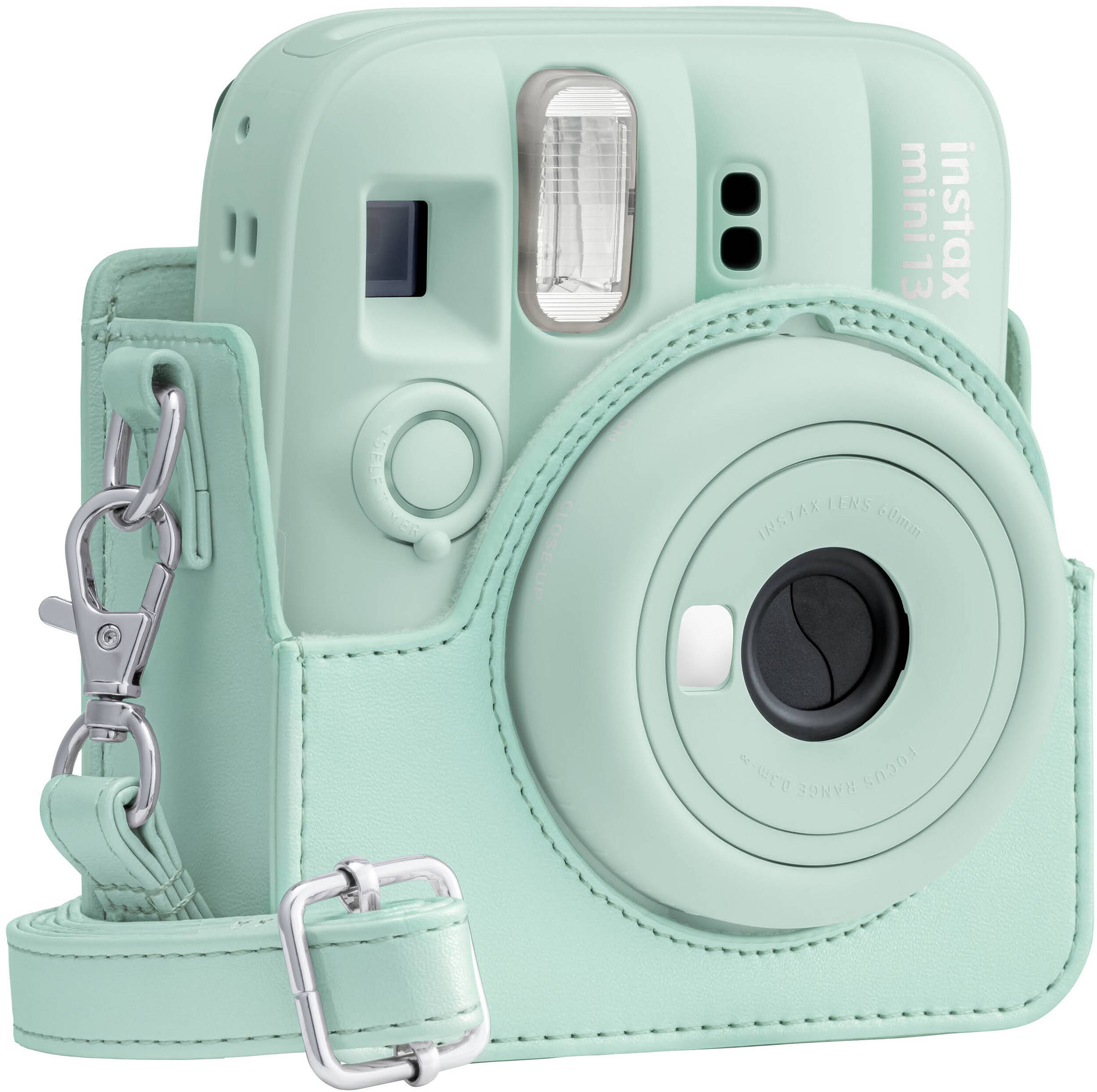 Une caméra instantanée Instax Mini 13 vert menthe avec un étui et une sangle en cuir assortis.