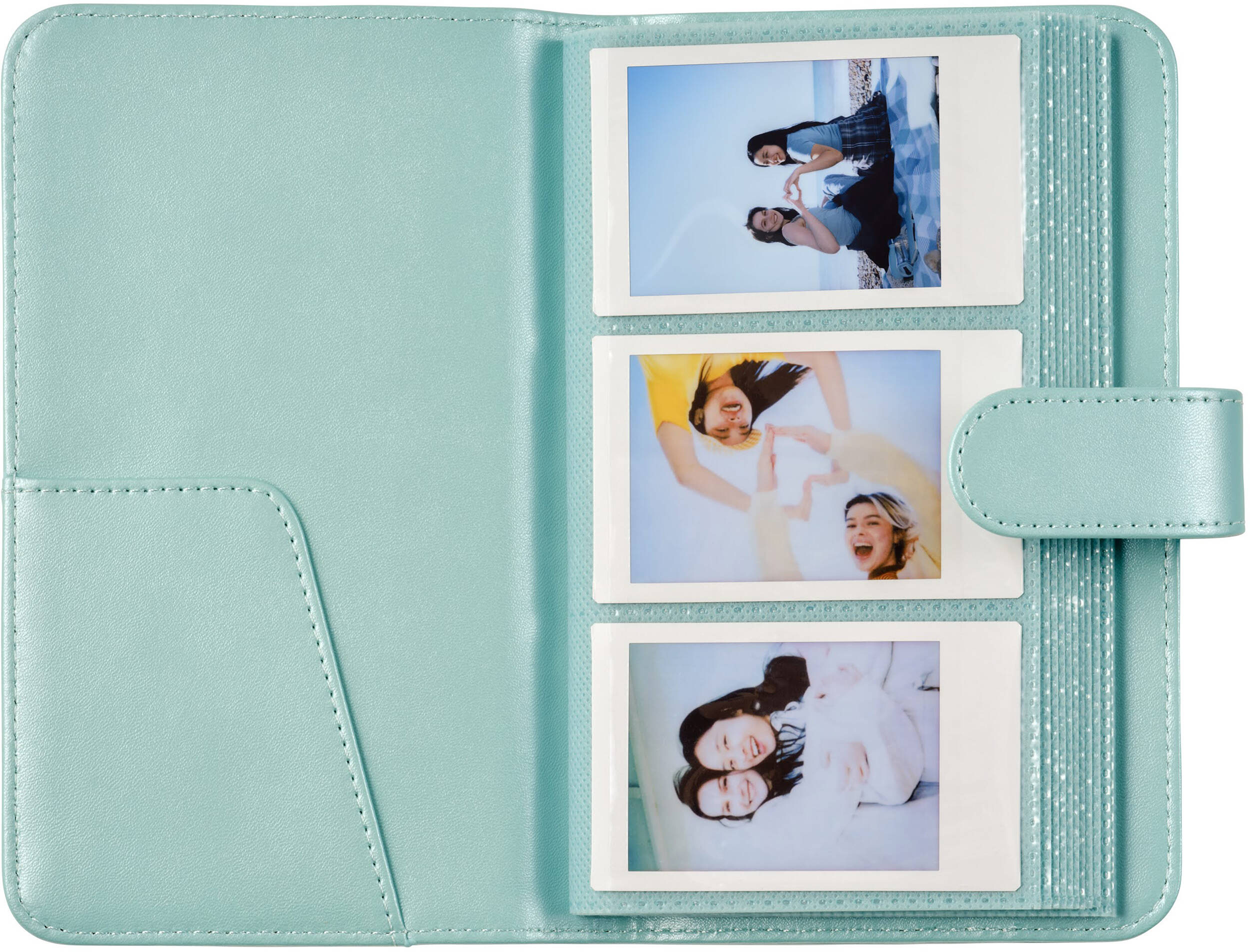 Une couverture d'album photo bleu clair avec trois photos de jeunes femmes.