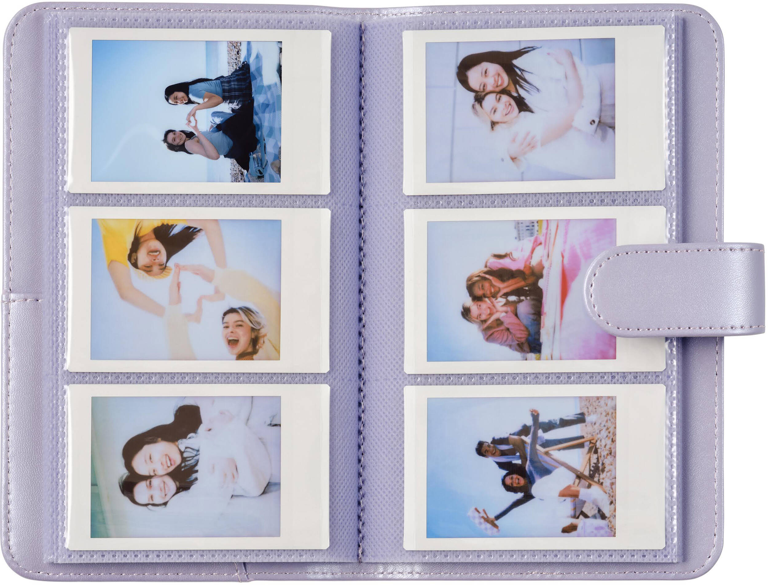 Un album photo violet contenant six photos instantanées de jeunes femmes.