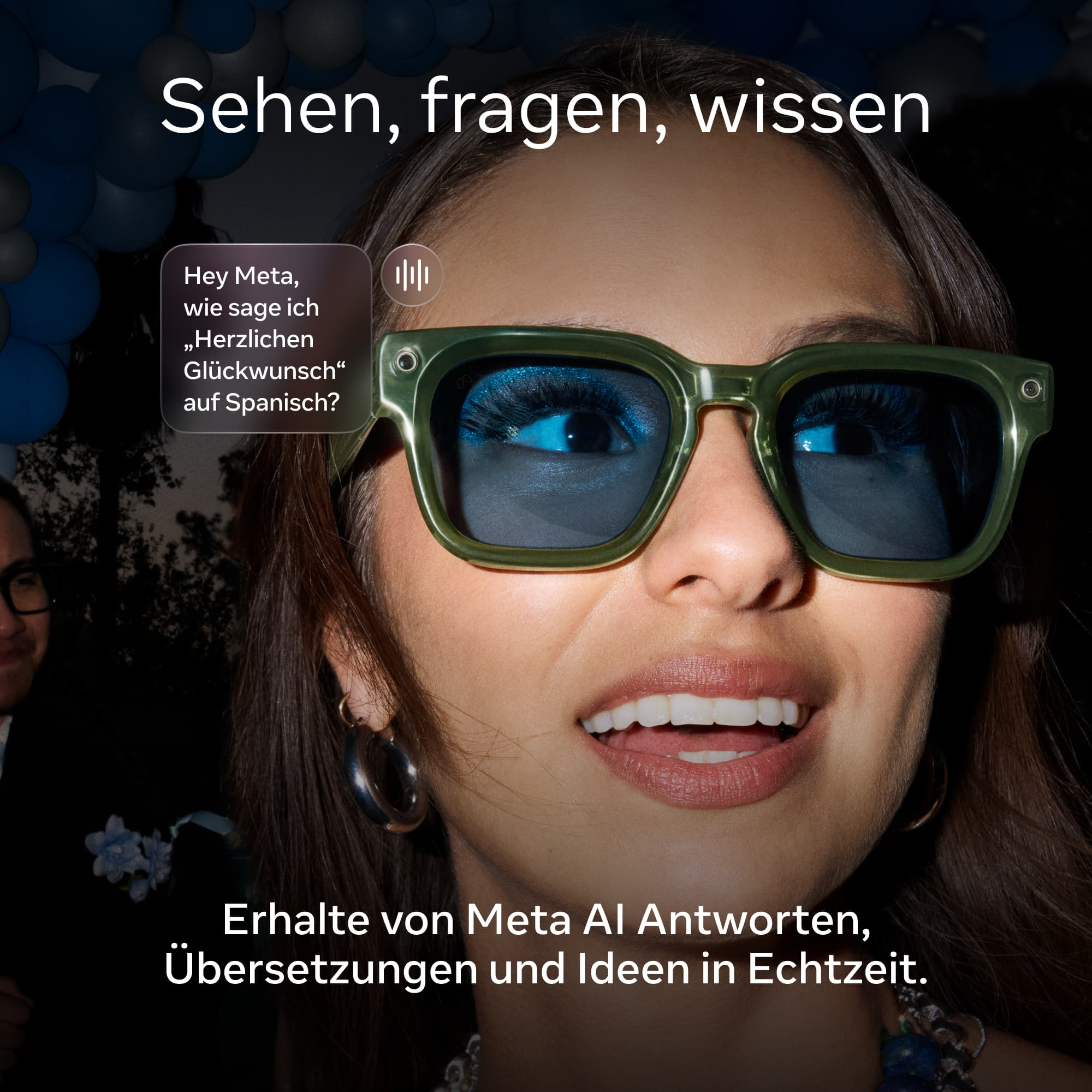 Frau mit grüner Brille fragt Meta, wie man „Herzlichen Glückwunsch“ auf Spanisch sagt.