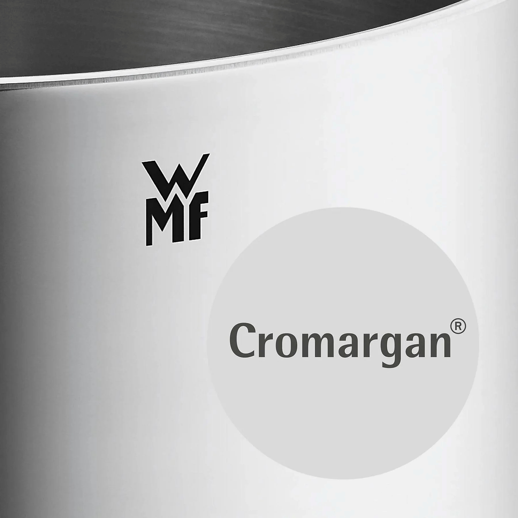WMF-Logo und "Cromargan®" auf einem silbernen Metallbehälter.