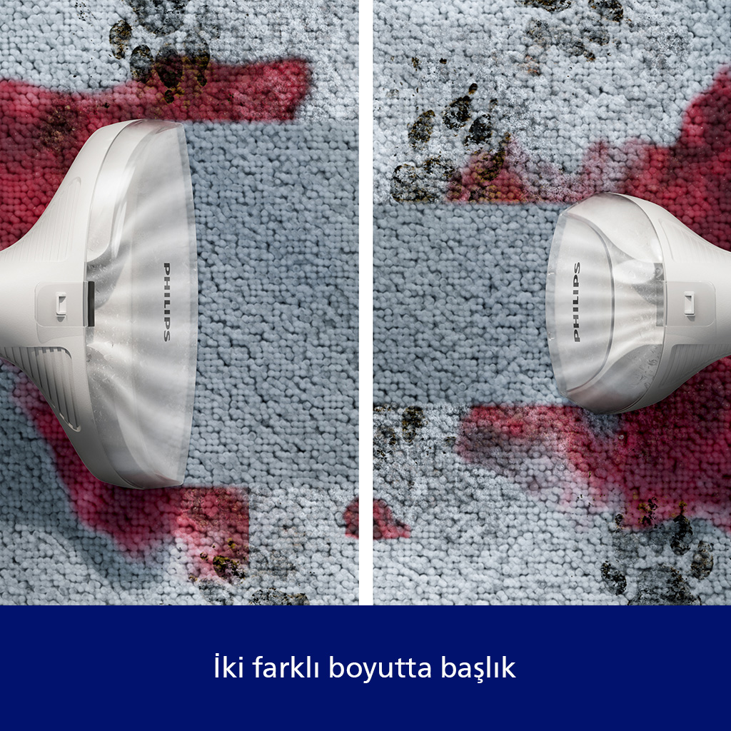 Beyaz Philips buharlı temizleyici başlıkları halı lekelerini temizler.