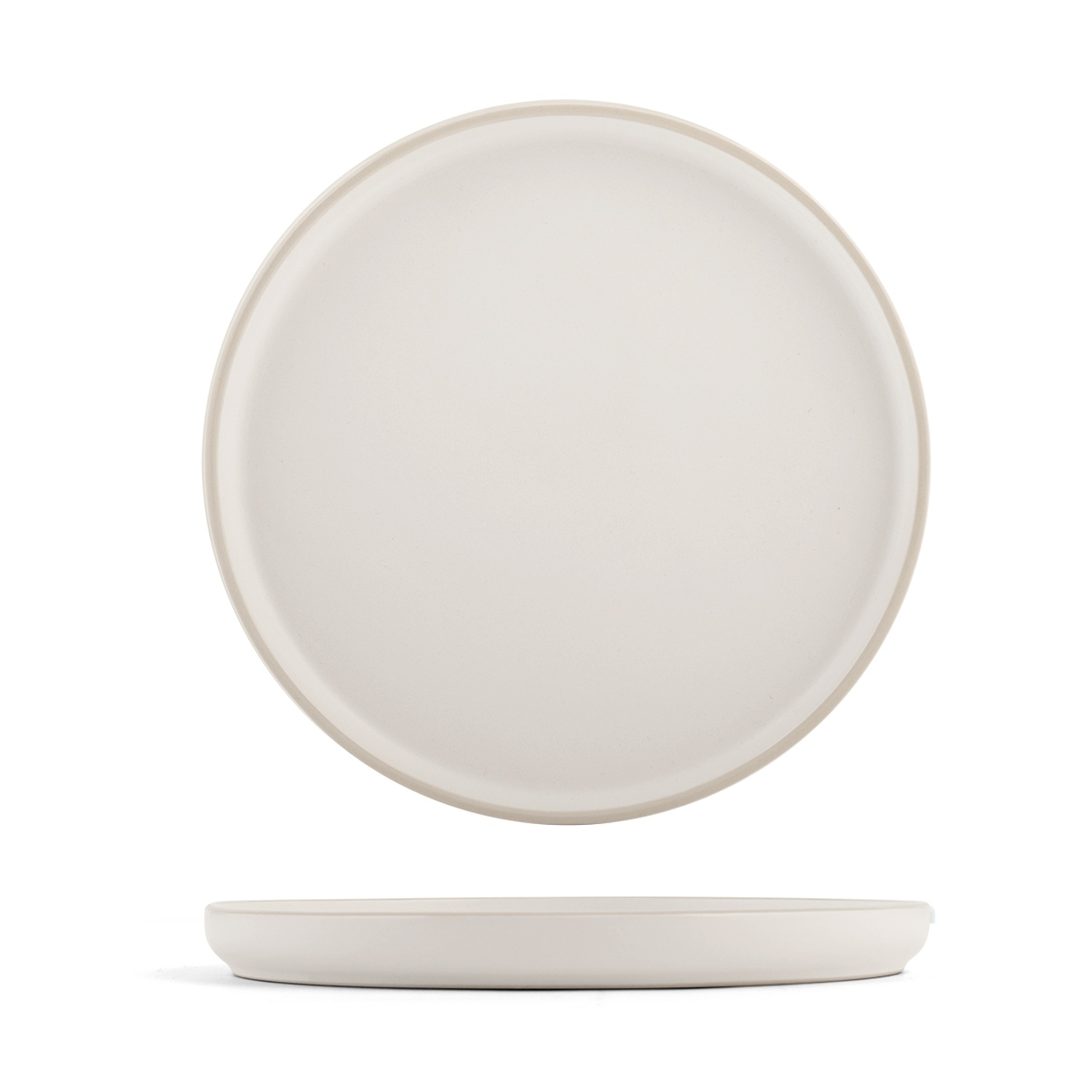 Un piatto in ceramica bianco visto frontalmente e di lato.