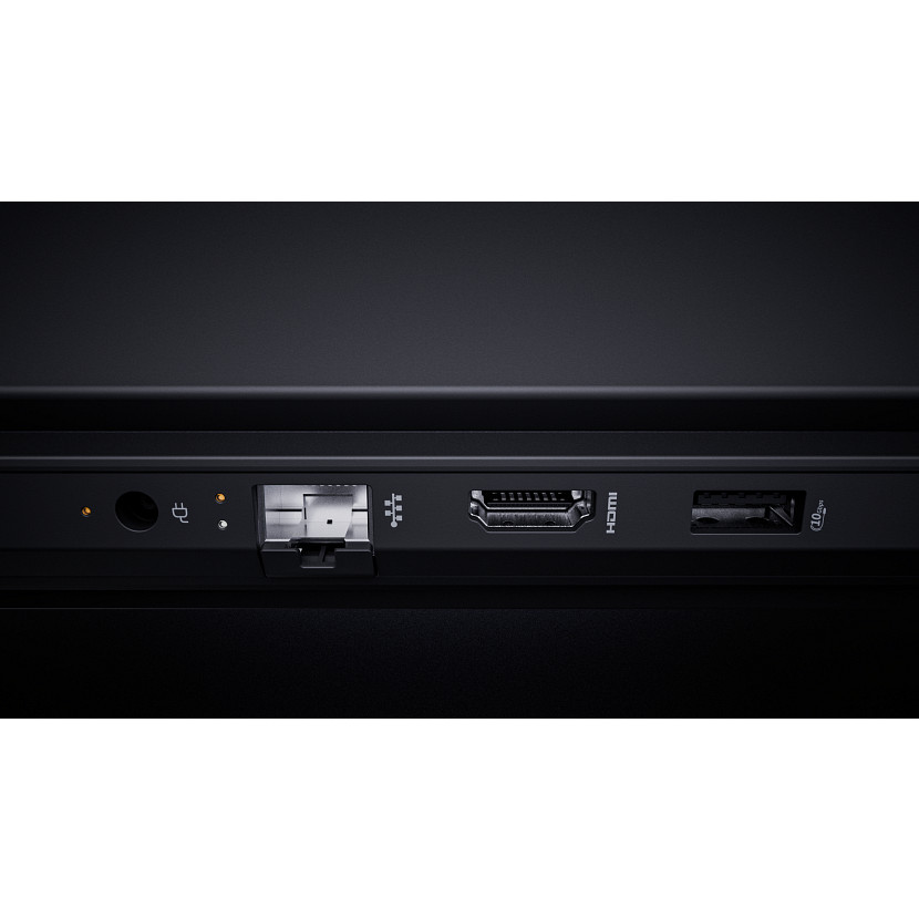 Zbliżenie portów laptopa: audio, USB, Ethernet, HDMI i USB-C.