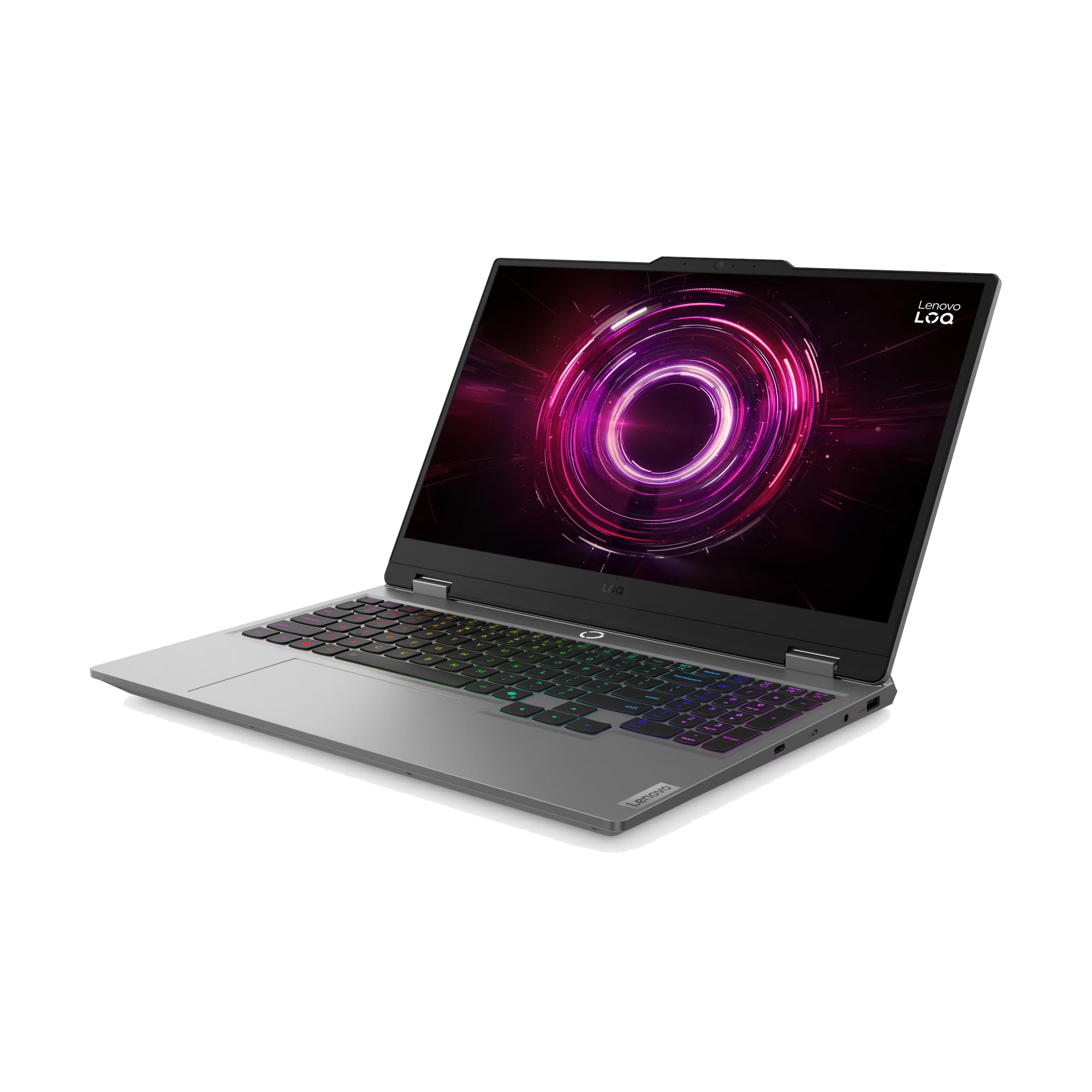 Un portátil plateado con teclado retroiluminado y diseño circular en la pantalla.