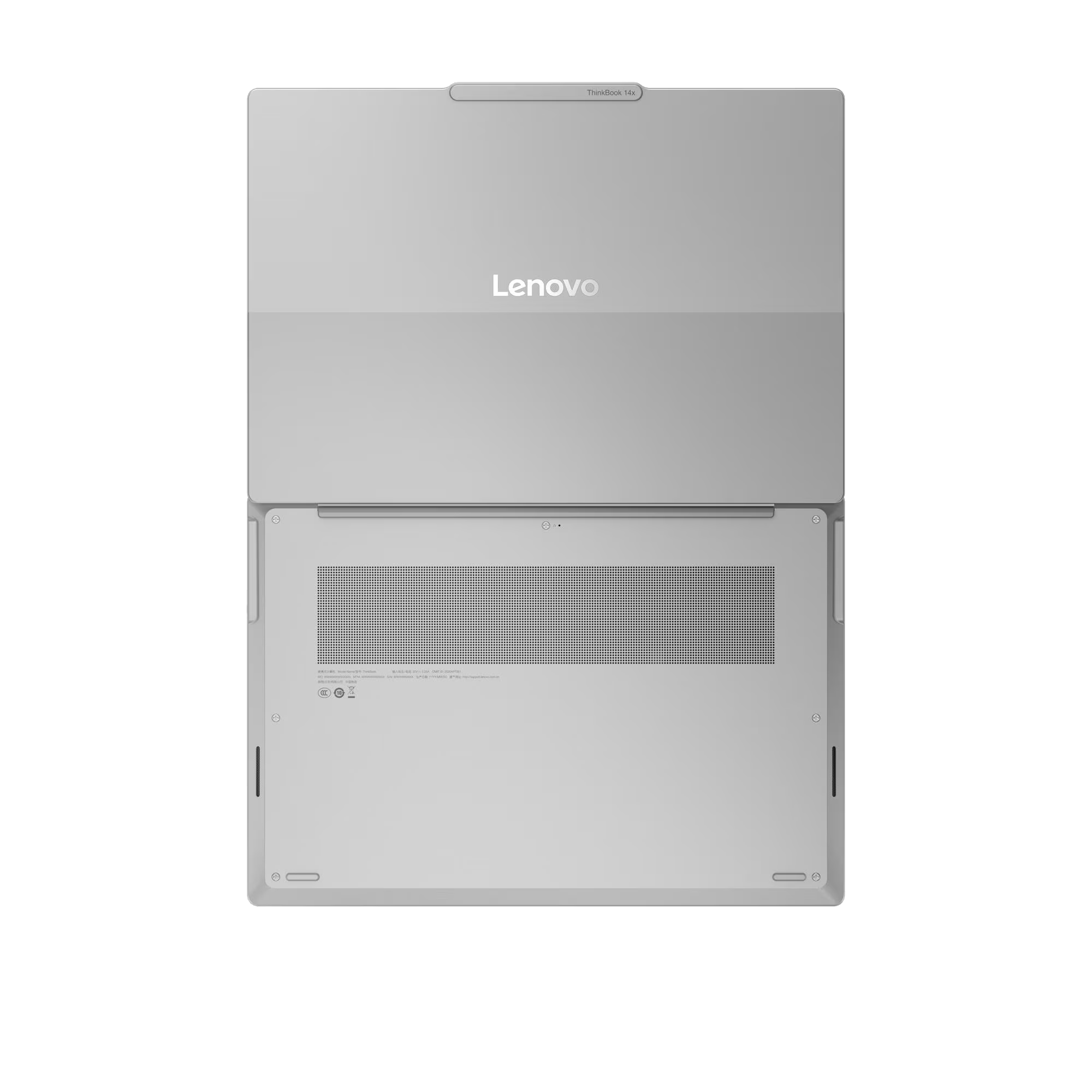 Vista inferior de un portátil plateado cerrado con logo de Lenovo.