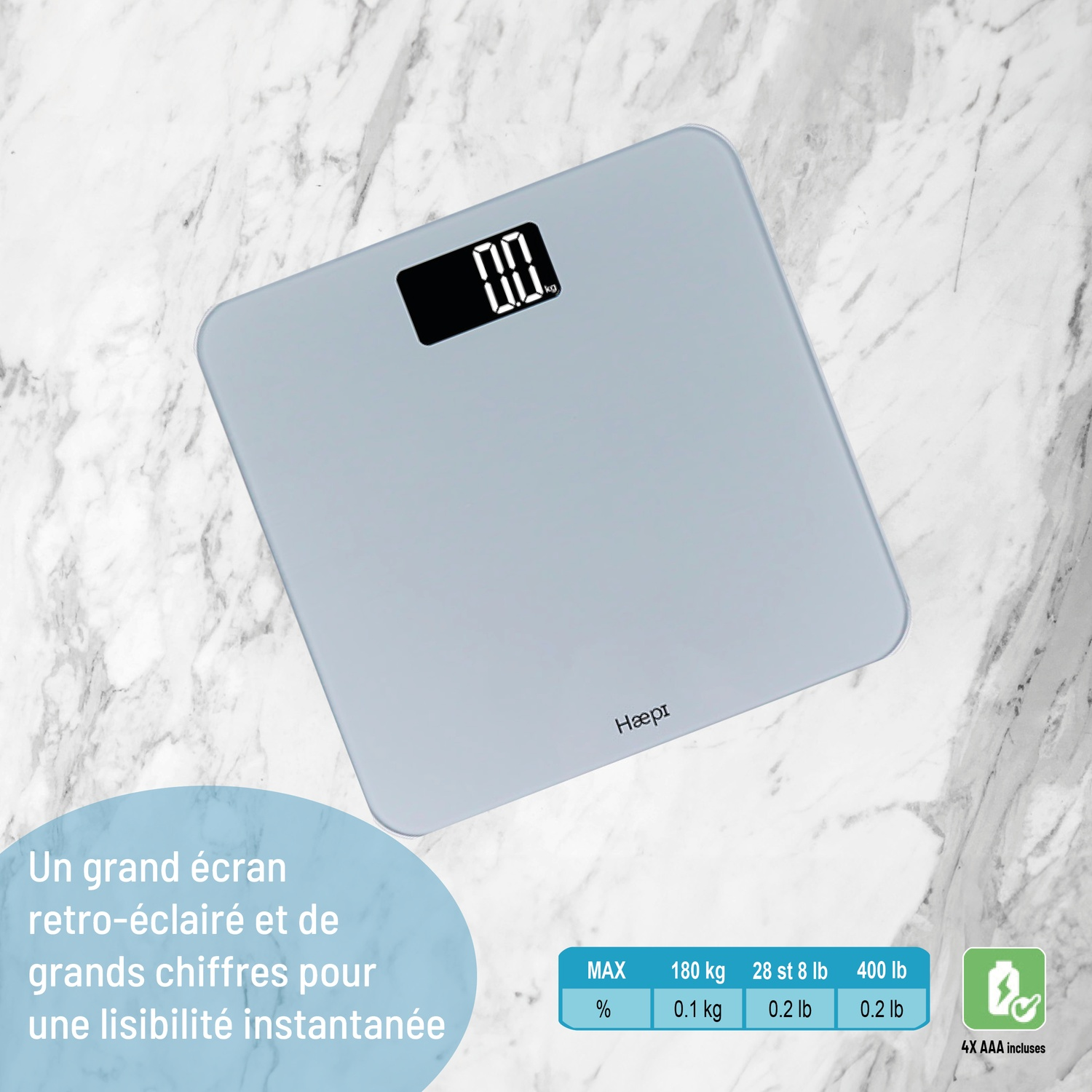 A gray digital scale rests on a marble surface.