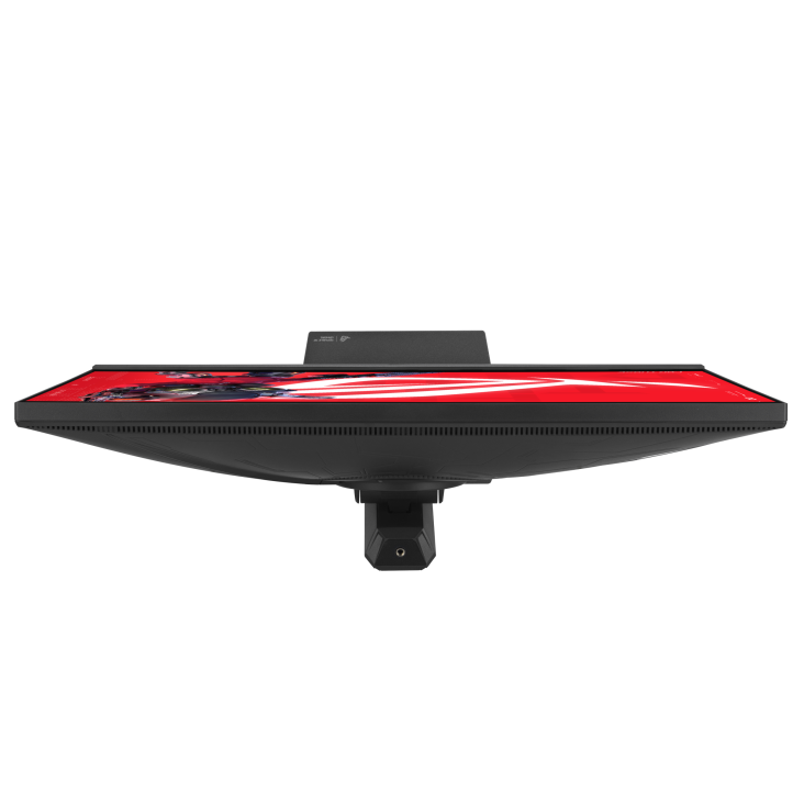 Un monitor negro con fondo de pantalla rojo, visto desde arriba.