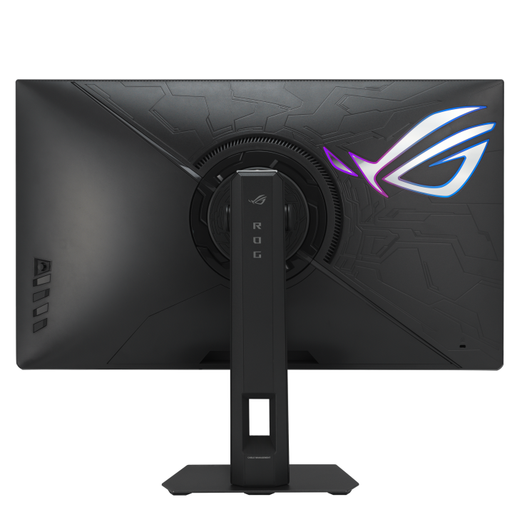 Parte trasera de un monitor negro con logo ROG iluminado y soporte.