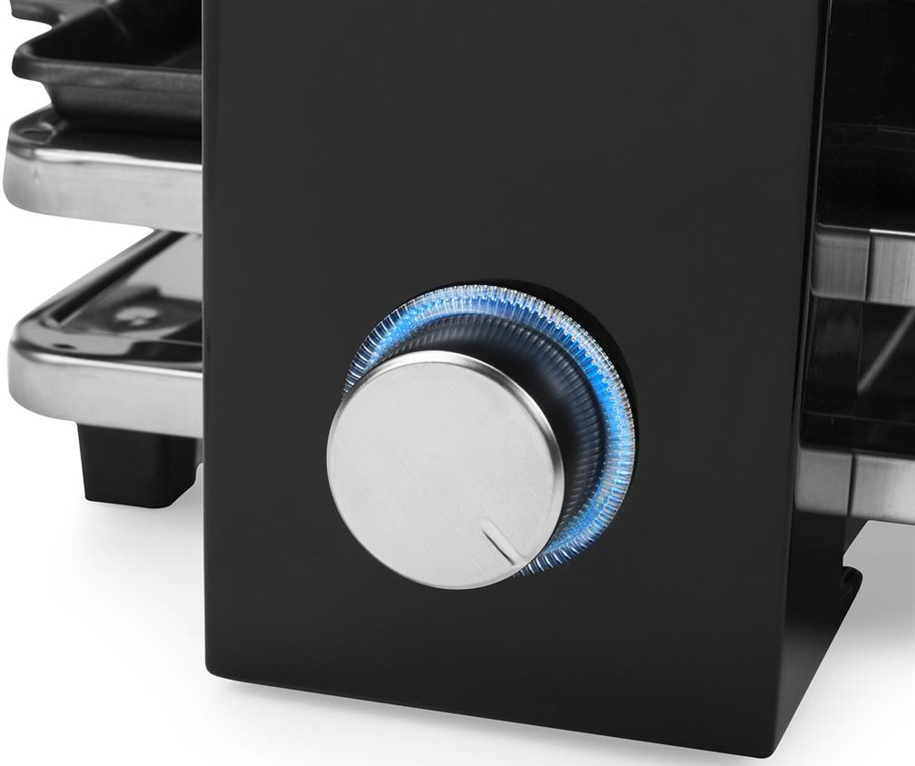 Elettrodomestico nero con quadrante argentato e anello LED blu.