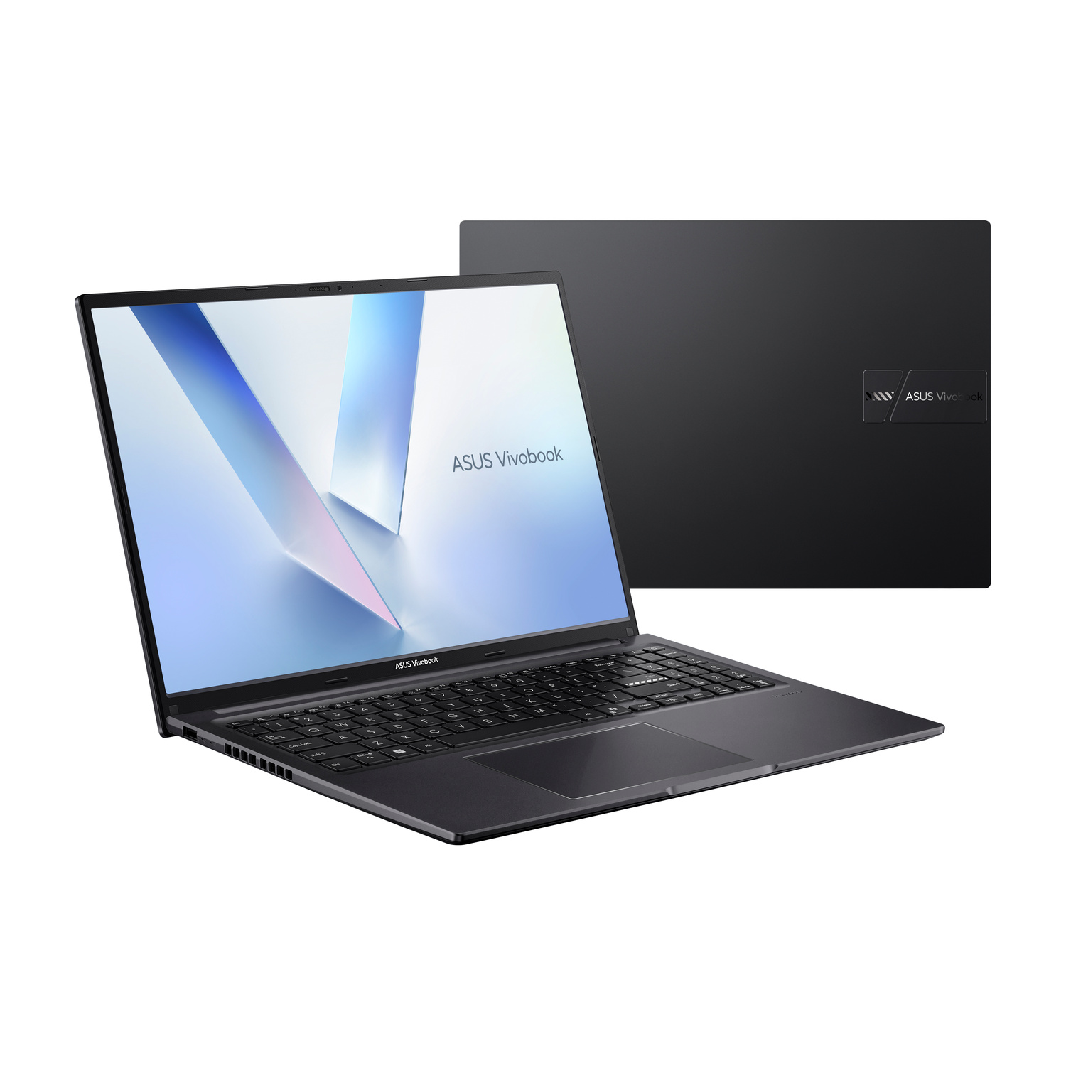 Un laptop scuro è aperto, lo schermo mostra un motivo astratto. Un secondo laptop è chiuso.