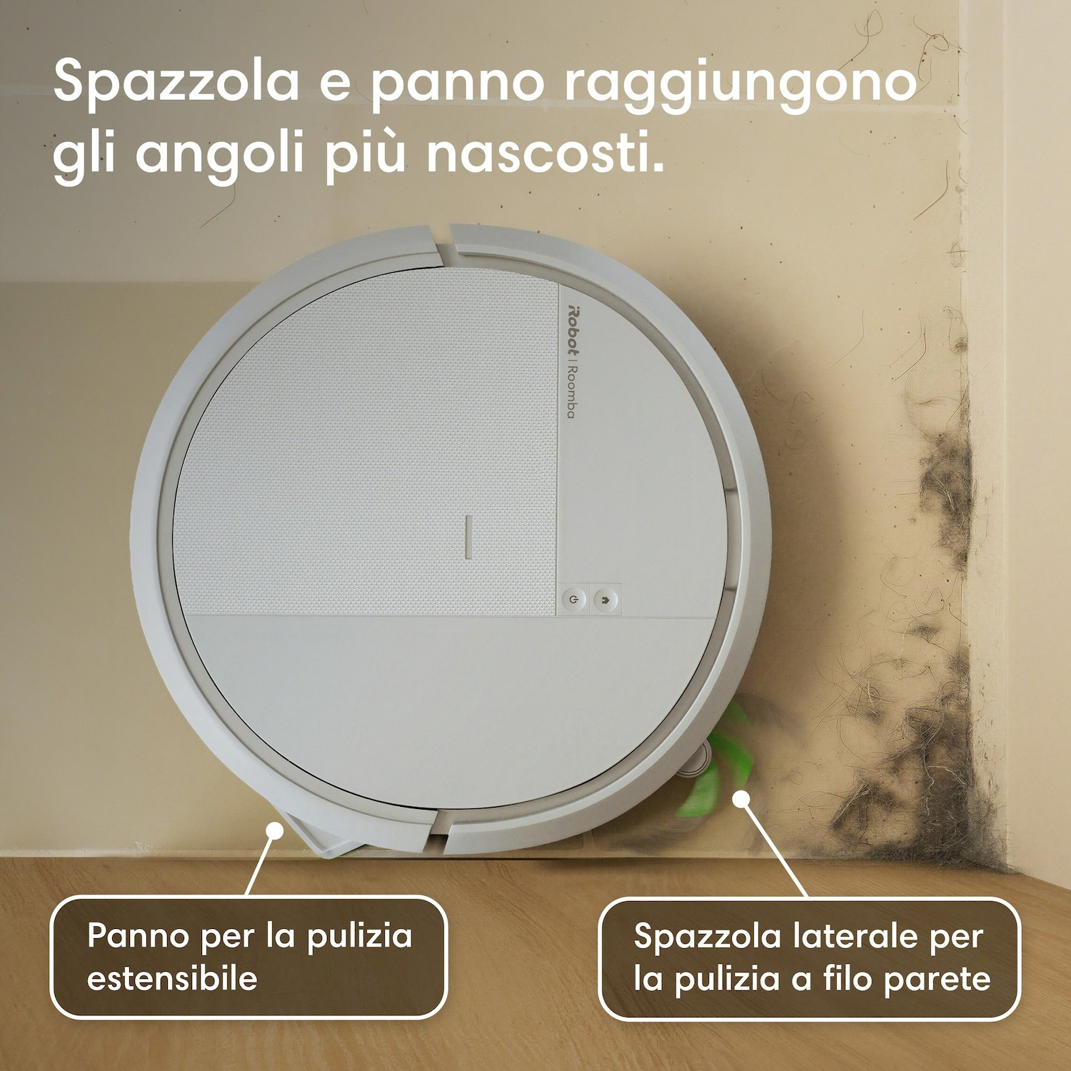 Un robot aspirapolvere bianco pulisce un angolo con spazzola laterale e panno.