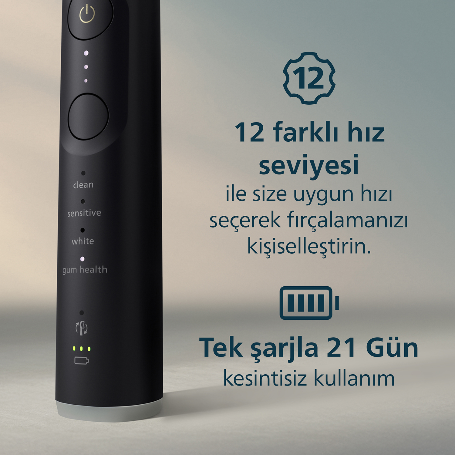12 hız ayarlı, 21 gün kullanım sunan siyah elektrikli diş fırçası.