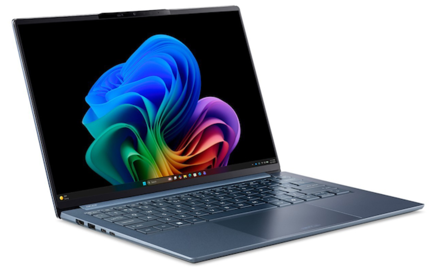 Un portátil azul que muestra un fondo de pantalla colorido con teclado visible.