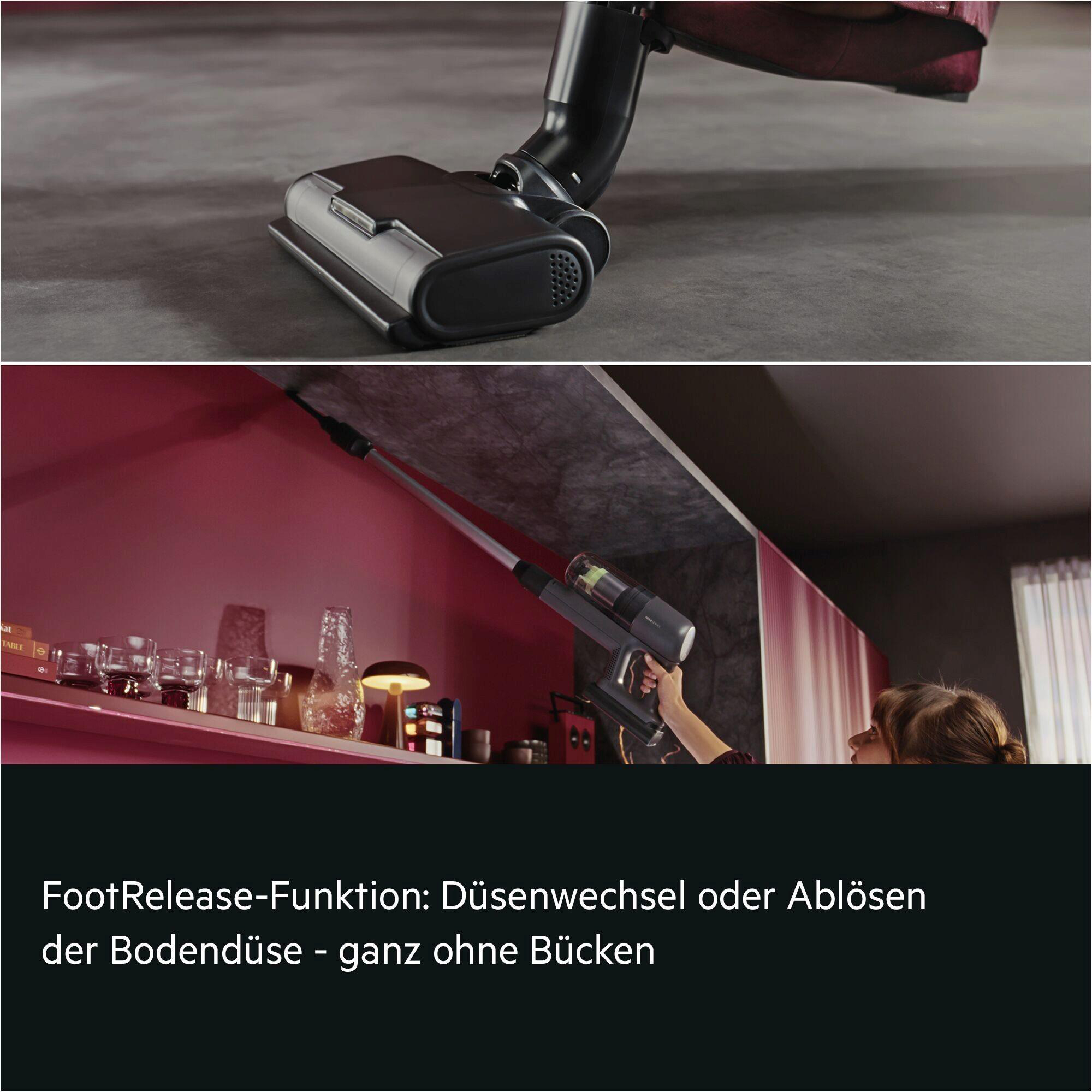 Handstaubsauger mit abnehmbarer Bodendüse und Zubehör auf einem Regal.