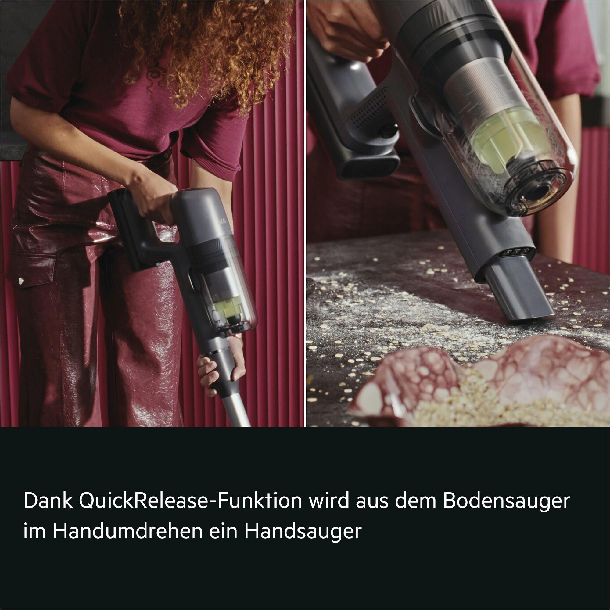 Eine Person hält einen schwarzen Handstaubsauger in der Hand und saugt Krümel auf.