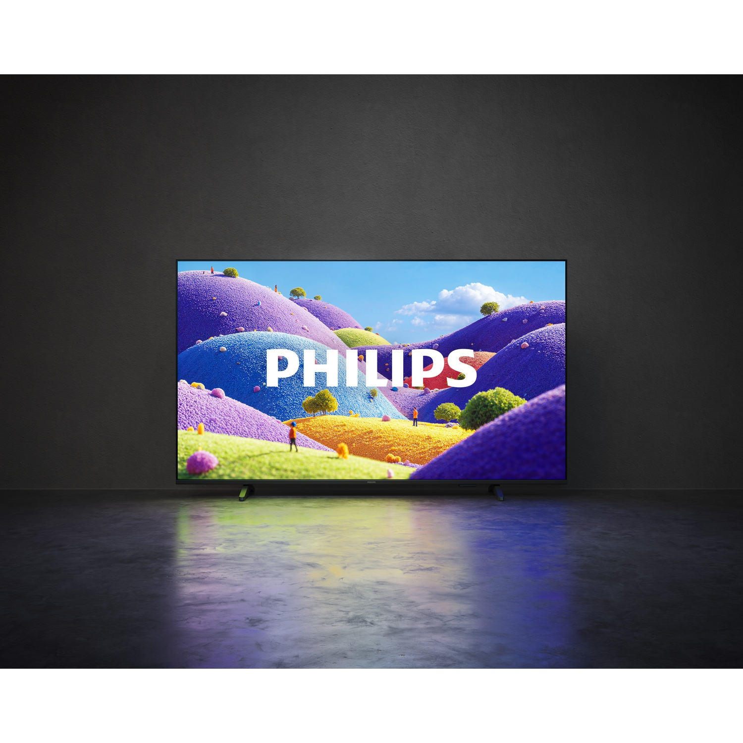 Een tv-scherm toont een kleurrijk heuvelachtig landschap met het Philips-logo.