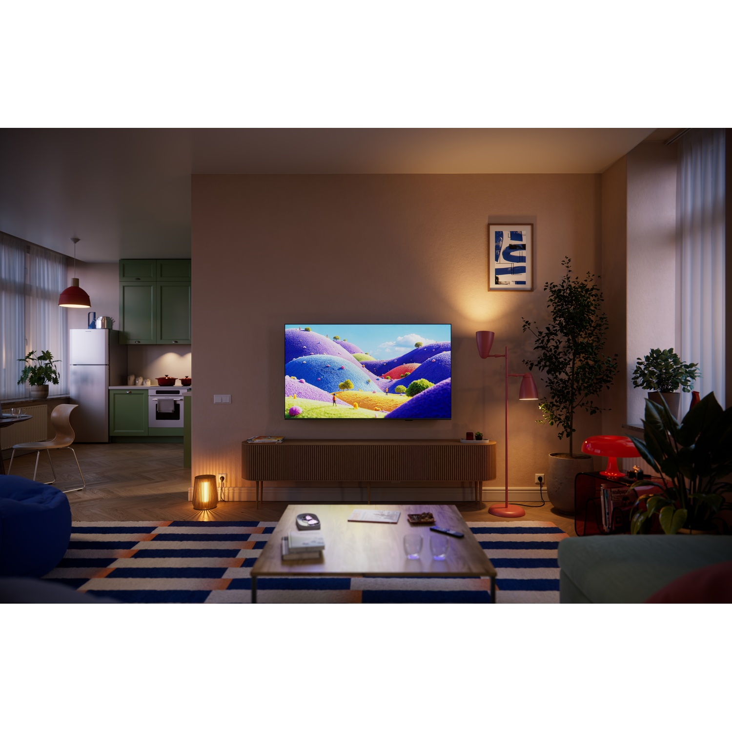 Gezellige woonkamer met tv die een kleurrijk landschap toont. Keuken op achtergrond.