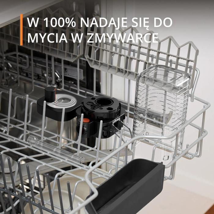 Czarna część i szklany pojemnik w koszu zmywarki.