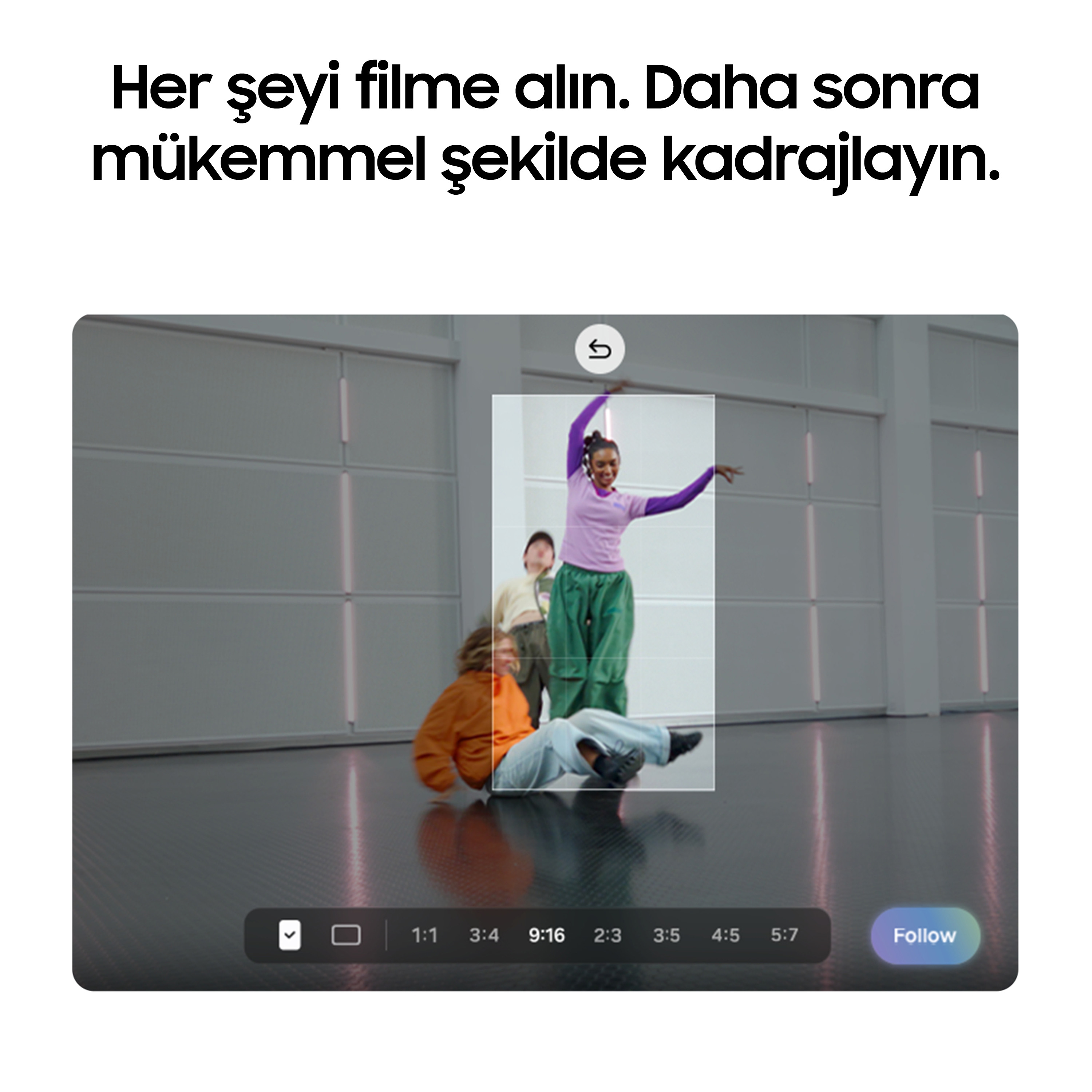 İki adam yerde yatarken bir kadın dans ediyor. Bir çerçeve gösteriliyor.
