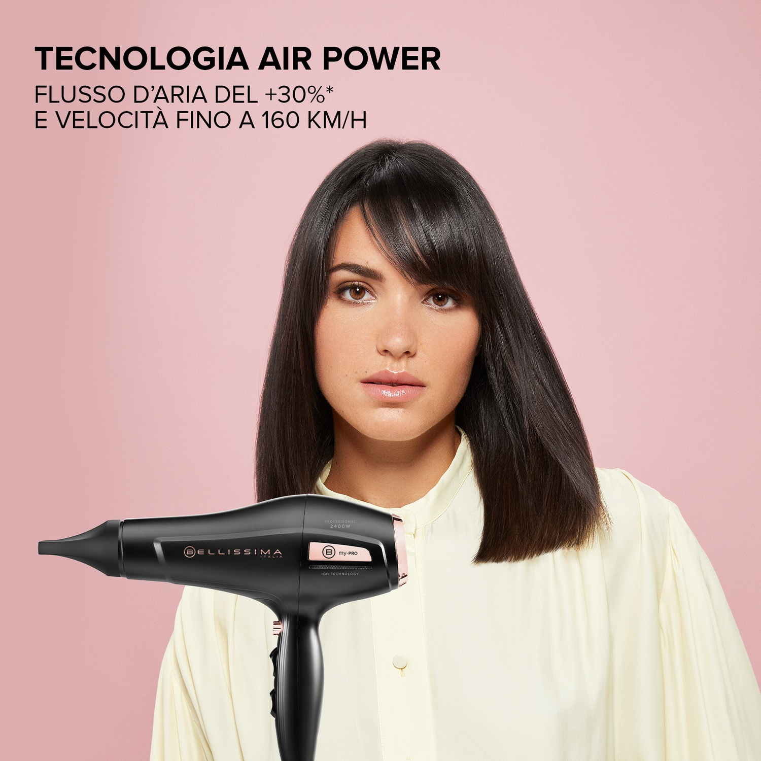 Donna con capelli scuri tiene asciugacapelli Bellissima nero. Testo descrive tecnologia Air Power.