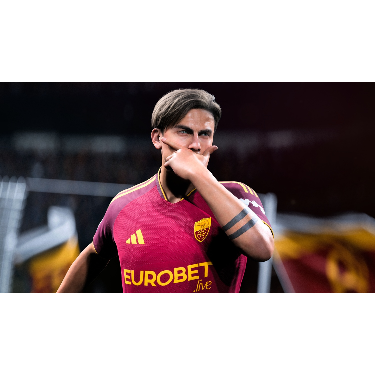 Football player in maroon and yellow jersey with "EUROBET" logo, hand to mouth.