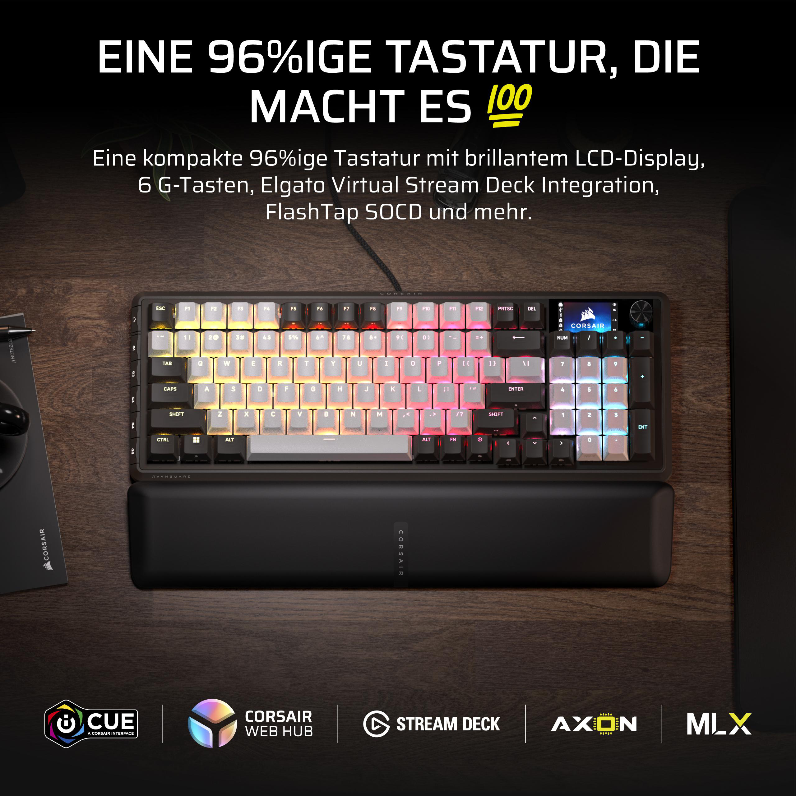 Eine beleuchtete 96%ige mechanische Tastatur mit LCD-Display, auf einem Holztisch.