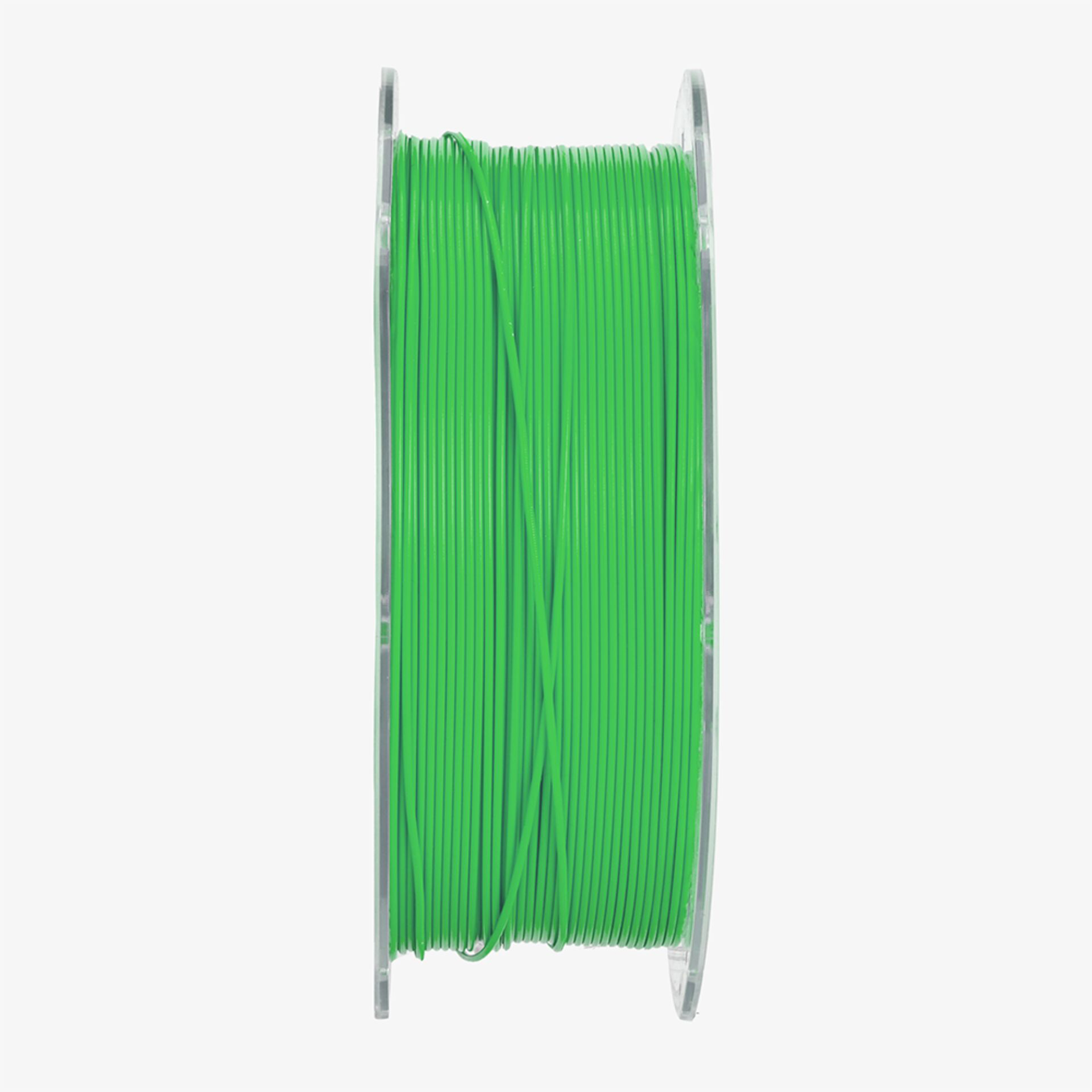 Eine Spule mit leuchtend grünem 3D-Druckfilament, das ordentlich aufgewickelt ist.