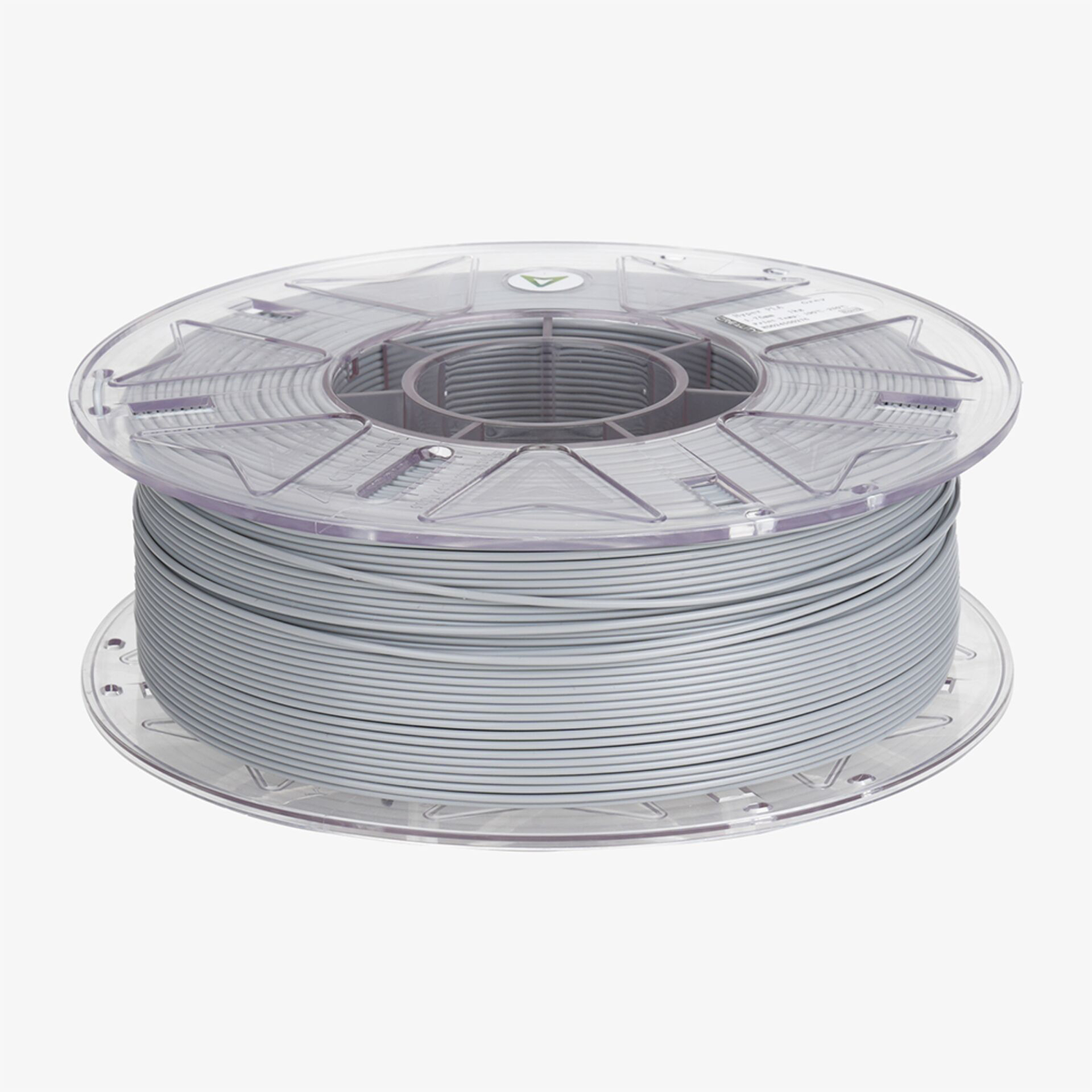 Eine Spule mit grauem 3D-Druckfilament auf transparentem Plastik.