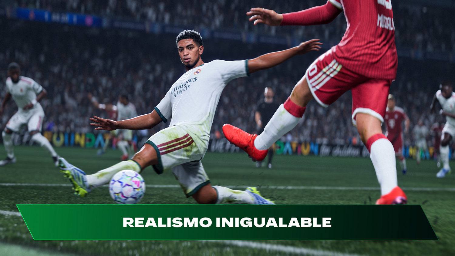 Jugador de fútbol con camiseta blanca se desliza en el césped, balón rojo, partido.