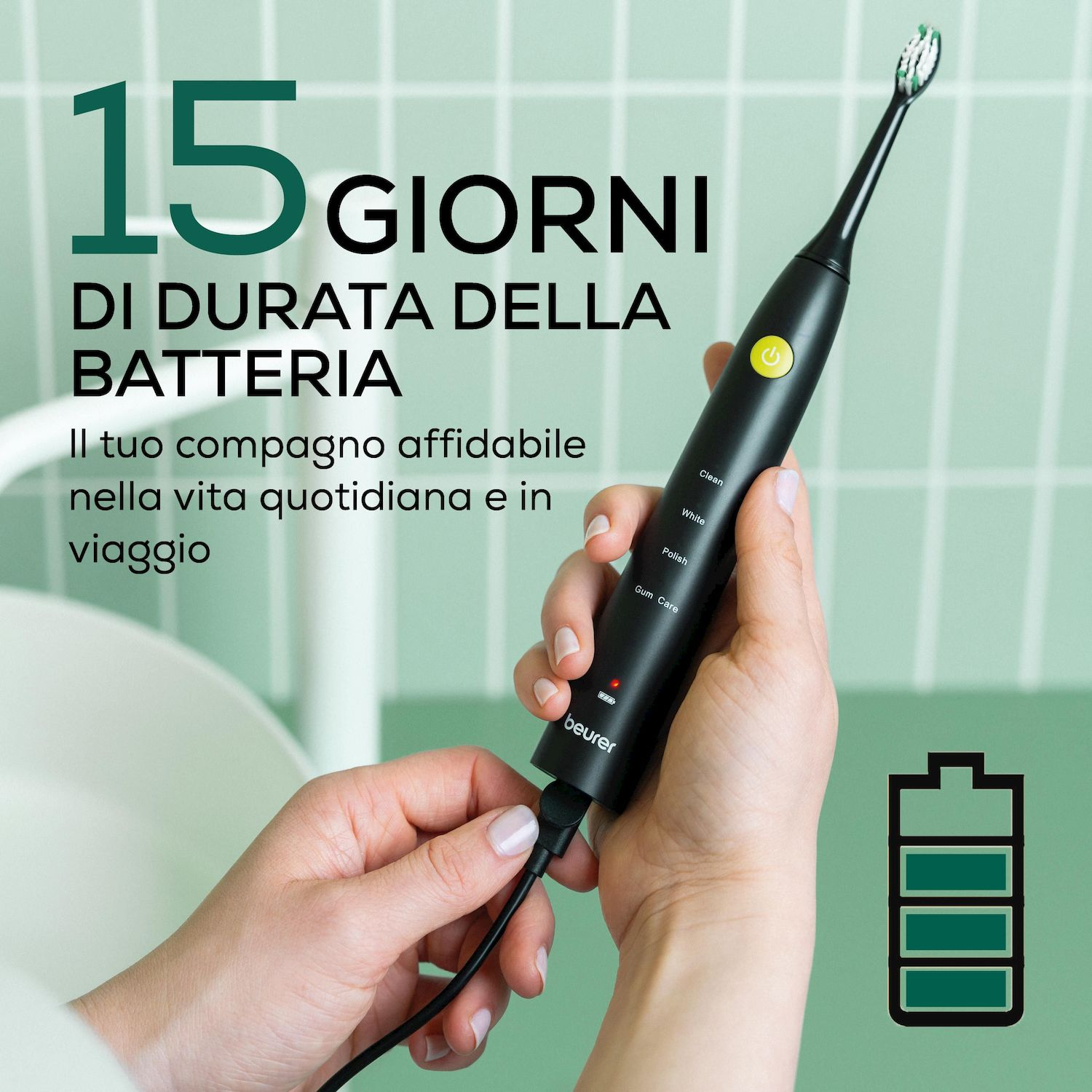 Una mano tiene uno spazzolino elettrico nero in carica. Il testo menziona 15 giorni di durata batteria.