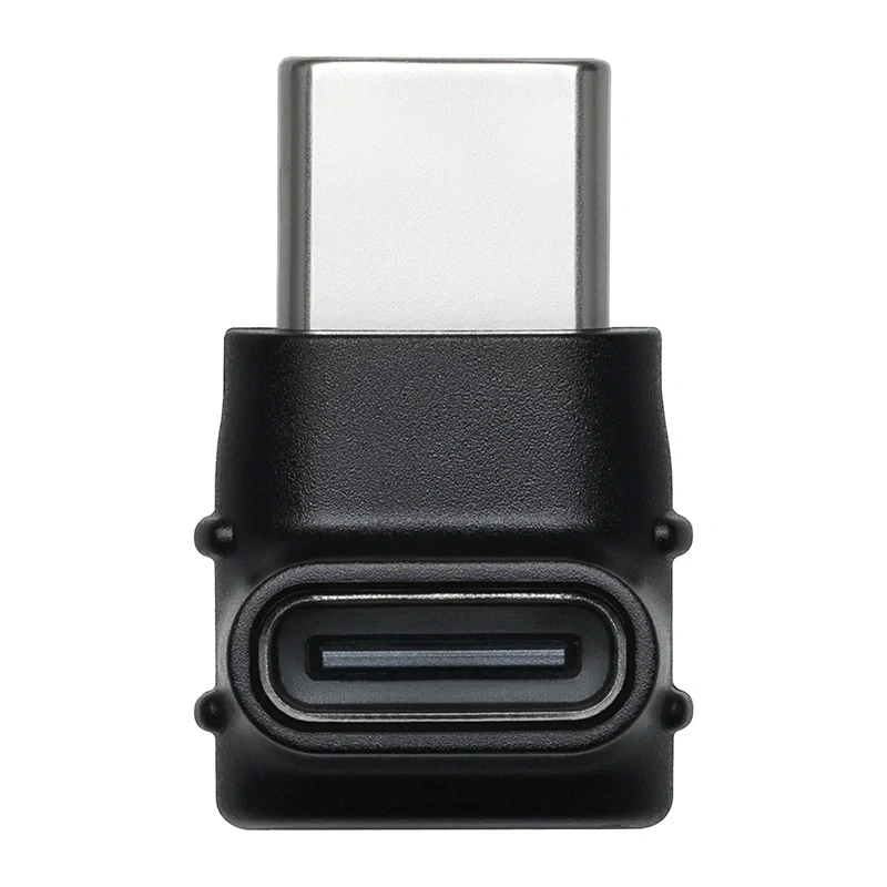 Czarny adapter USB-C ze srebrną wtyczką męską i żeńskim portem.