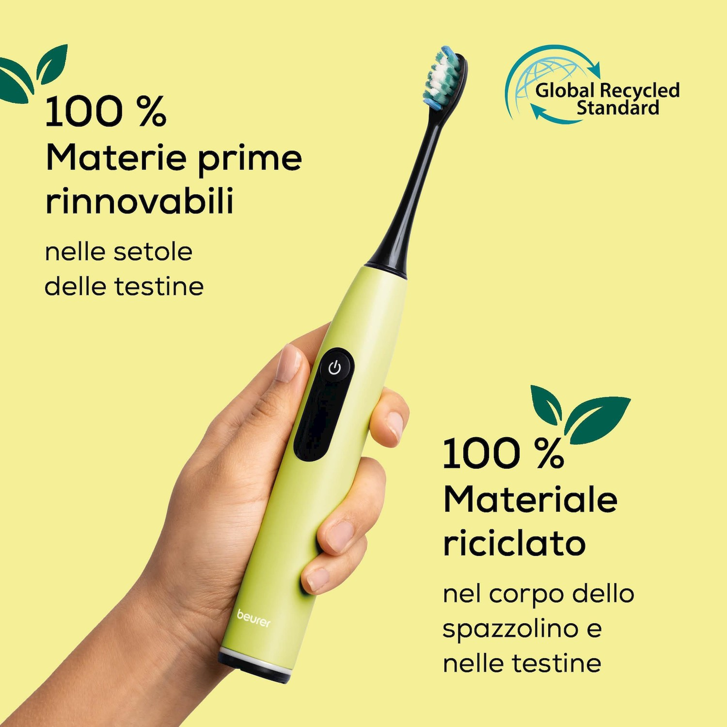 Una mano tiene uno spazzolino elettrico verde chiaro con manico nero e setole blu. Testo sul riciclo.
