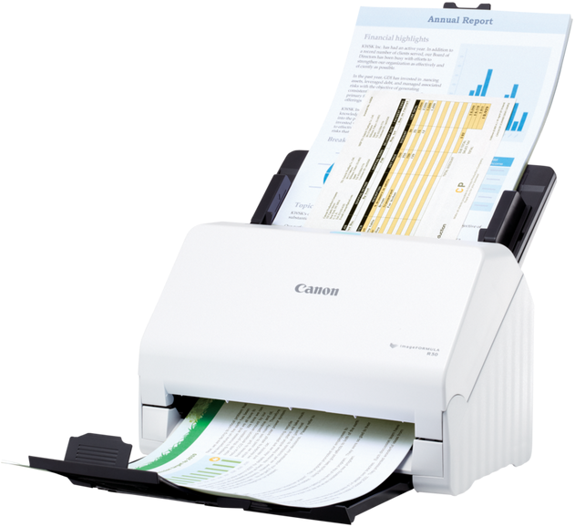 Uno scanner per documenti Canon bianco elabora report finanziari e fogli di calcolo su sfondo nero.