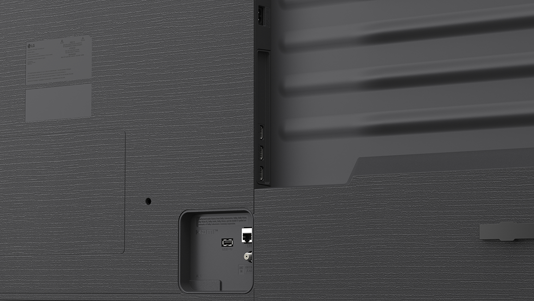 Egy sötétszürke LG tévé hátlapja különféle csatlakozóportokkal, például HDMI-vel és USB-vel.
