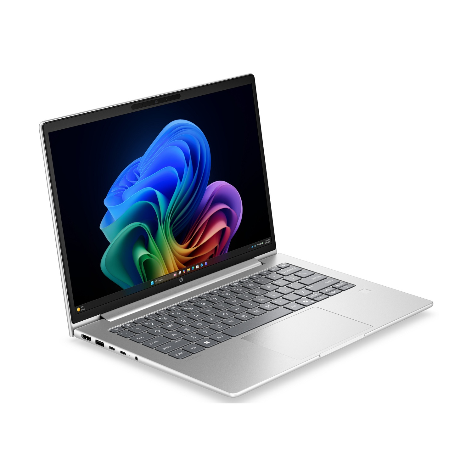Un computer portatile argentato con tastiera nera e uno sfondo astratto colorato.
