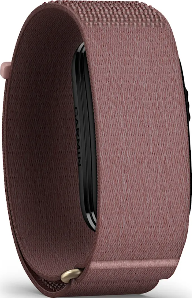 Un tracker d'activité Garmin avec un bracelet en nylon rose tissé et un boîtier noir.
