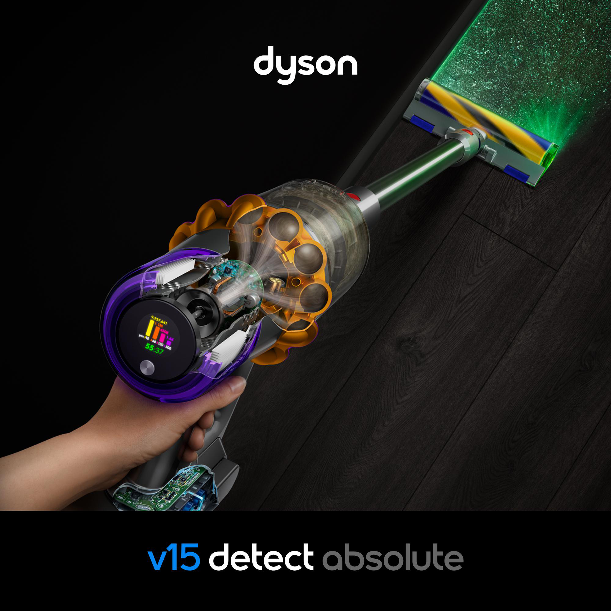 Schnittmodell eines Dyson V15 Detect Absolute Staubsaugers mit sichtbarem Innenleben und grünem Laser auf dem Boden.