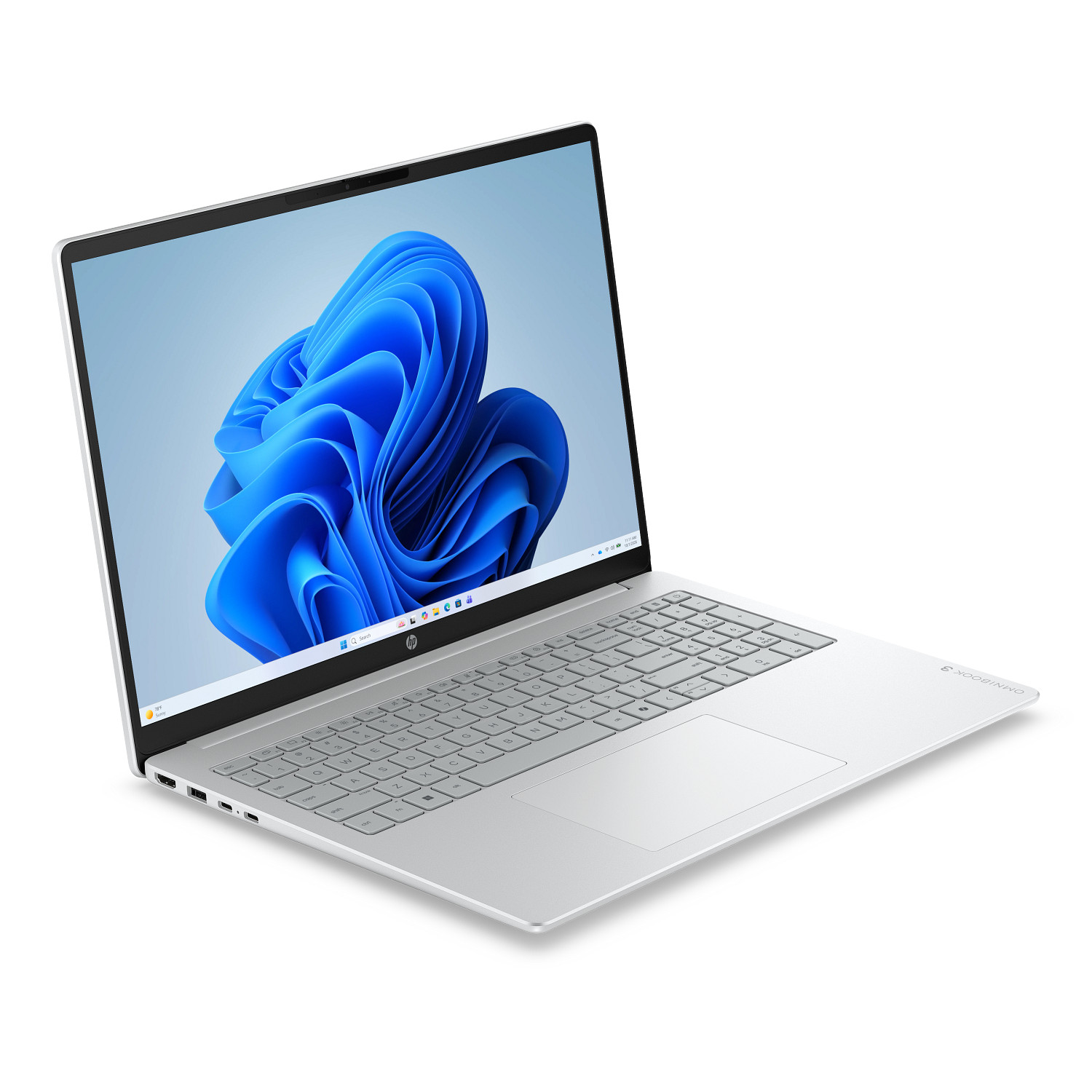 Un portátil HP plateado abierto sobre una superficie blanca con un fondo de pantalla abstracto azul.